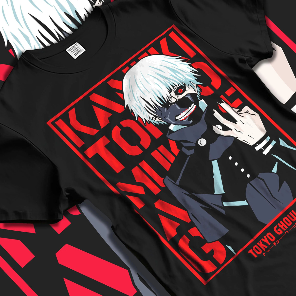 Black T-shirt laid flat with natural folds featuring Ken Kaneki One-Eyed King Tokyo Ghoul artwork.