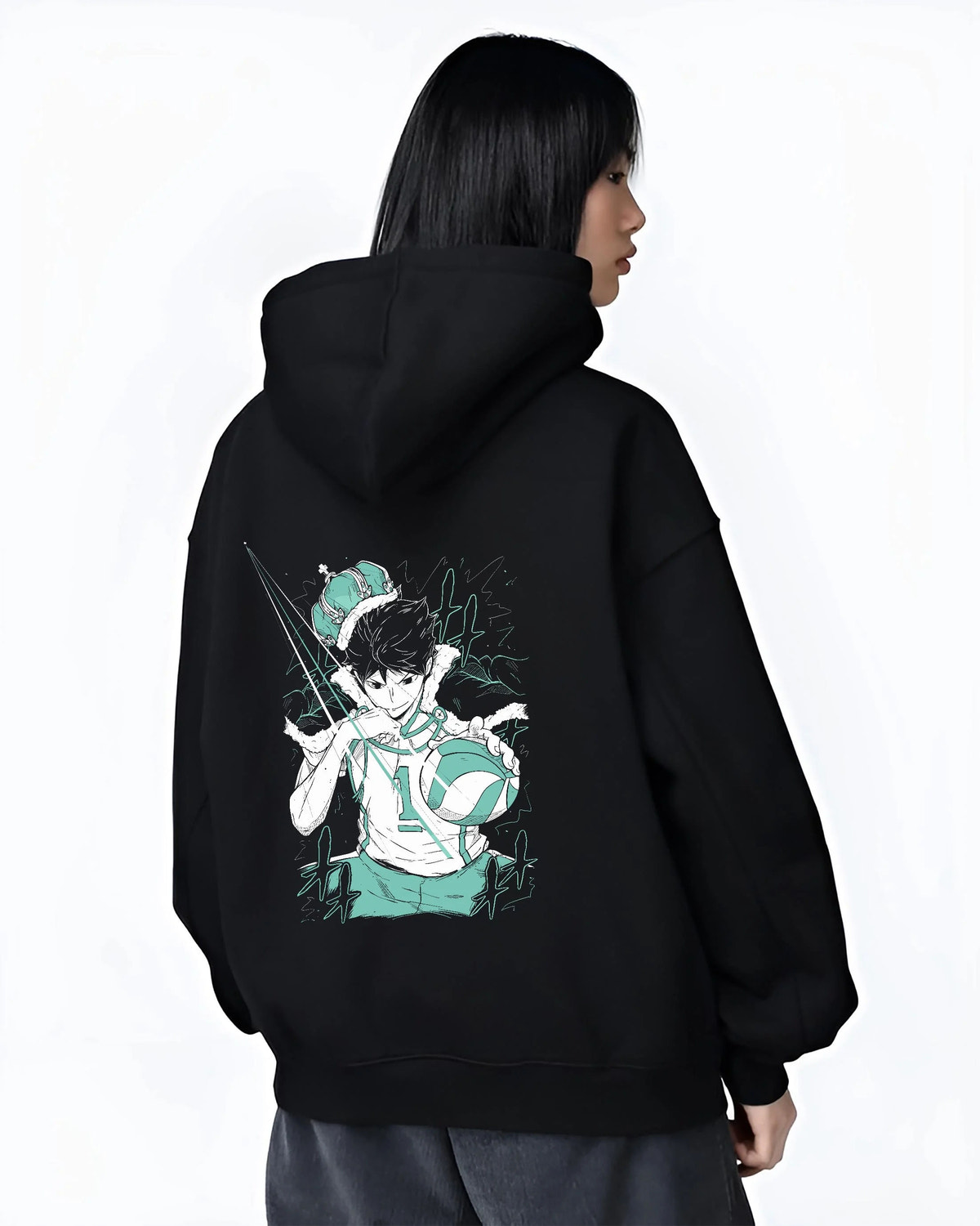 Black hoodie worn by female model from the back featuring Toru Oikawa setter volleyball king Haikyuu artwork.