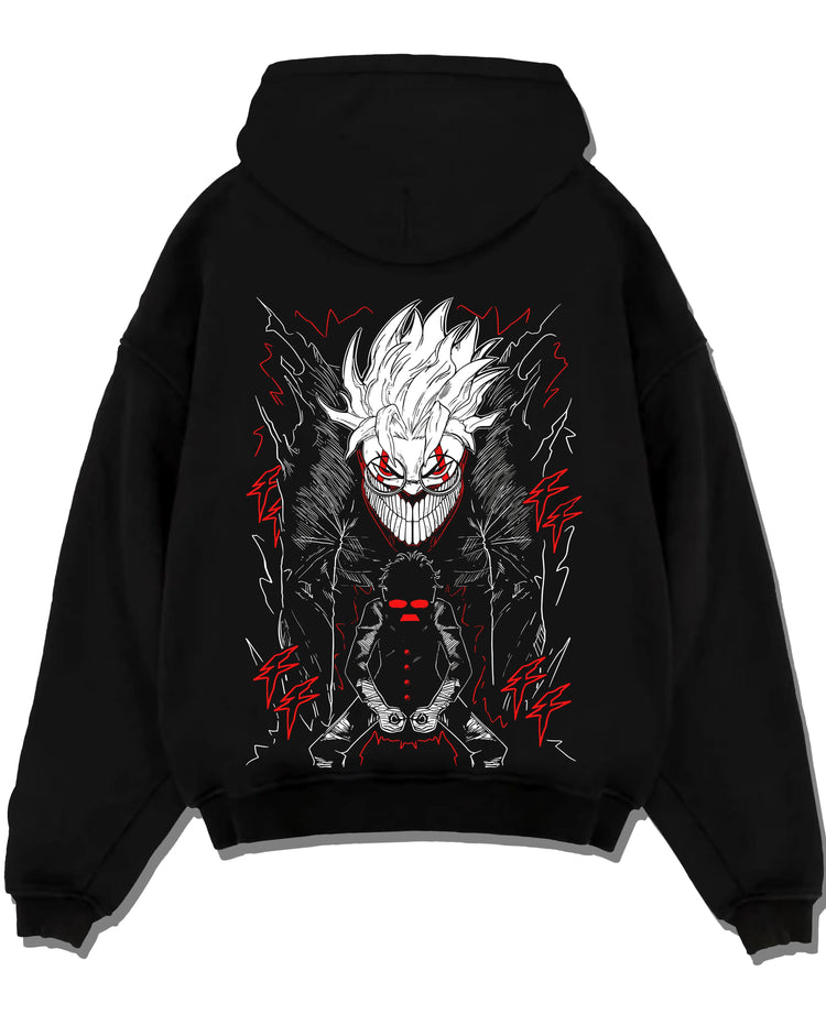Black pullover hoodie laid flat with Okarun Hoodie Dandadan Alien Fighter Design graphic bold anime graphic.