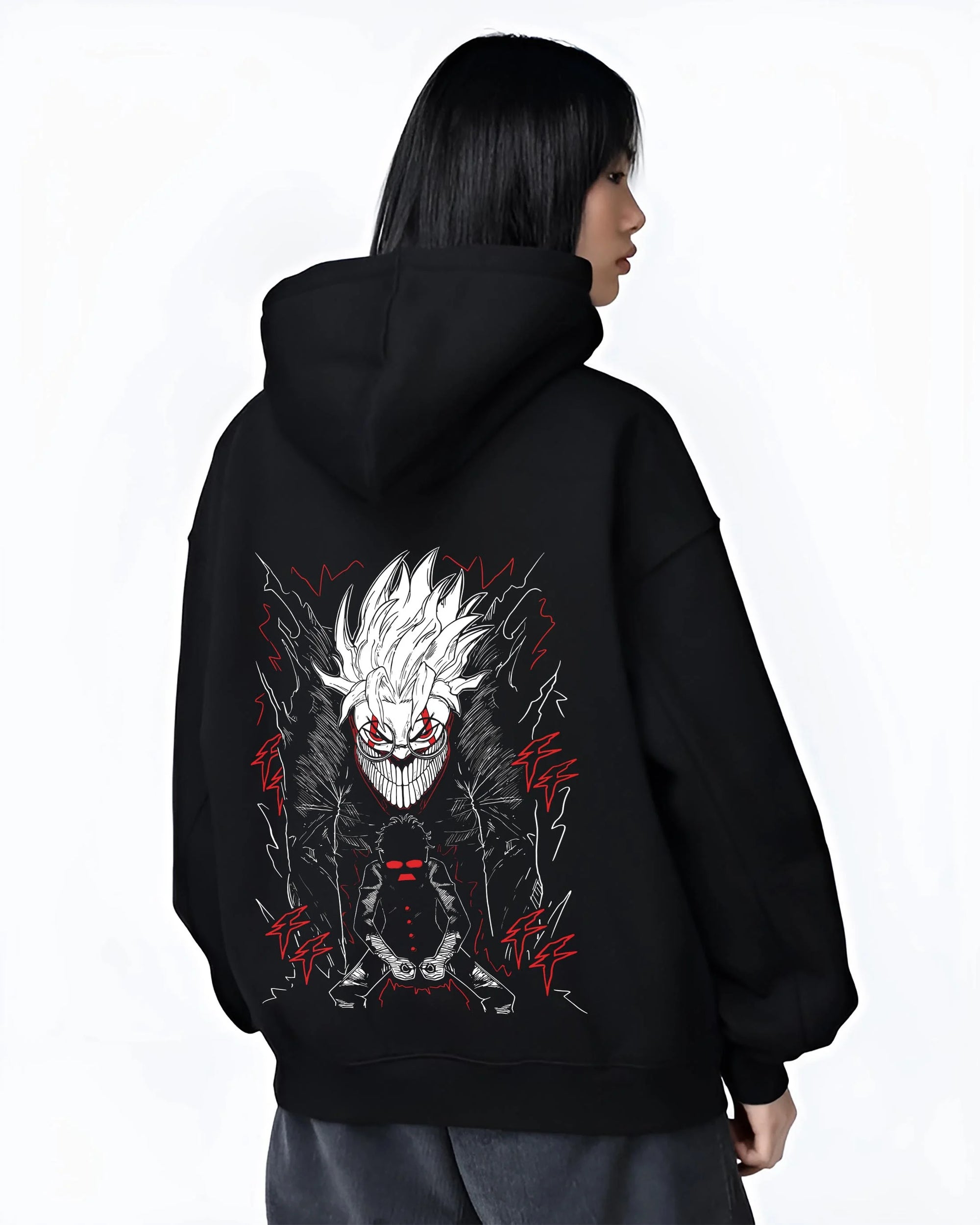Black hoodie worn by female model, back view with Okarun Hoodie Dandadan Alien Fighter Design graphic streetwear graphic.