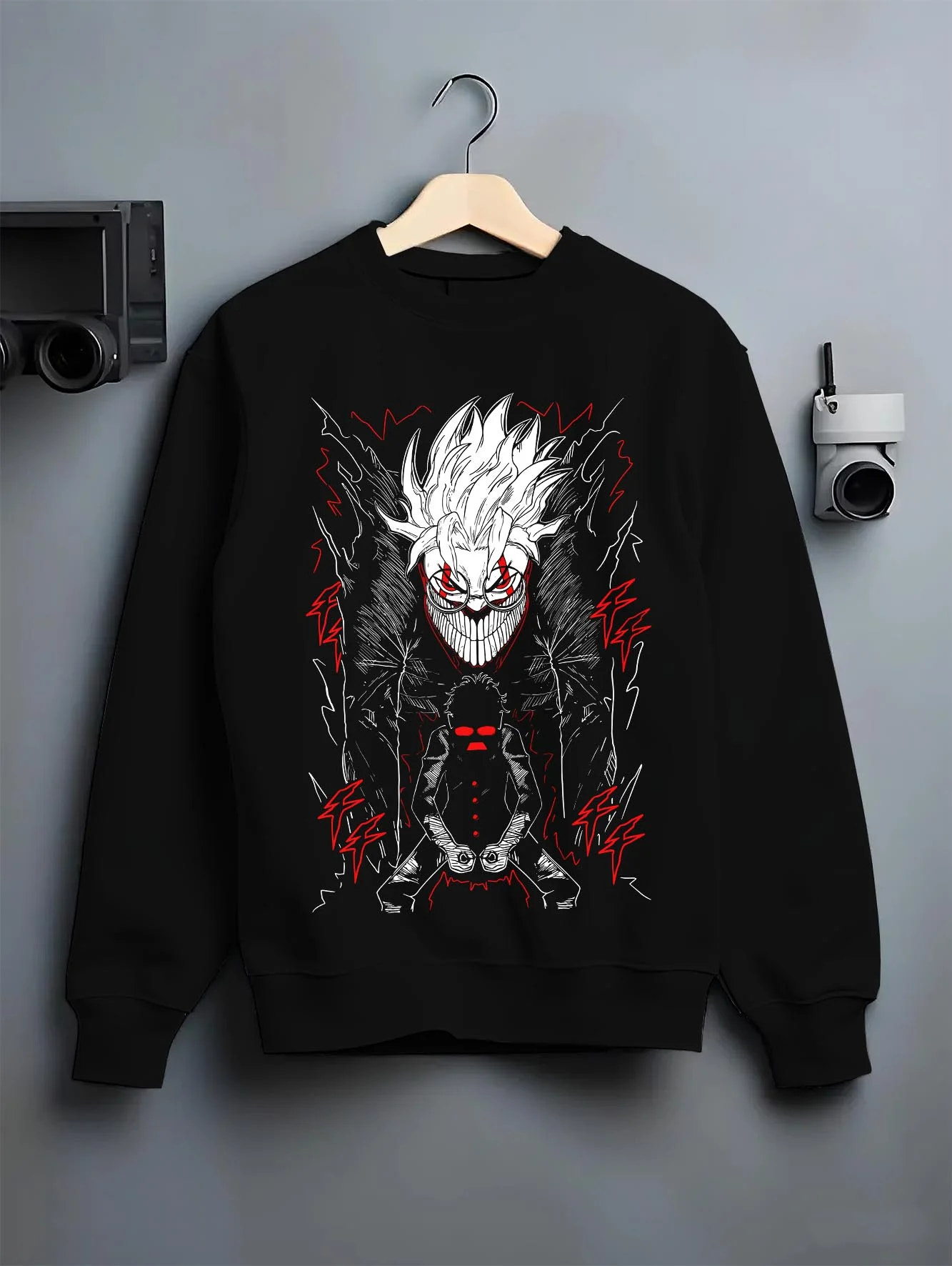 Black crewneck sweatshirt on hanger with Okarun Hoodie Dandadan Alien Fighter Design graphic Okarun anime design.