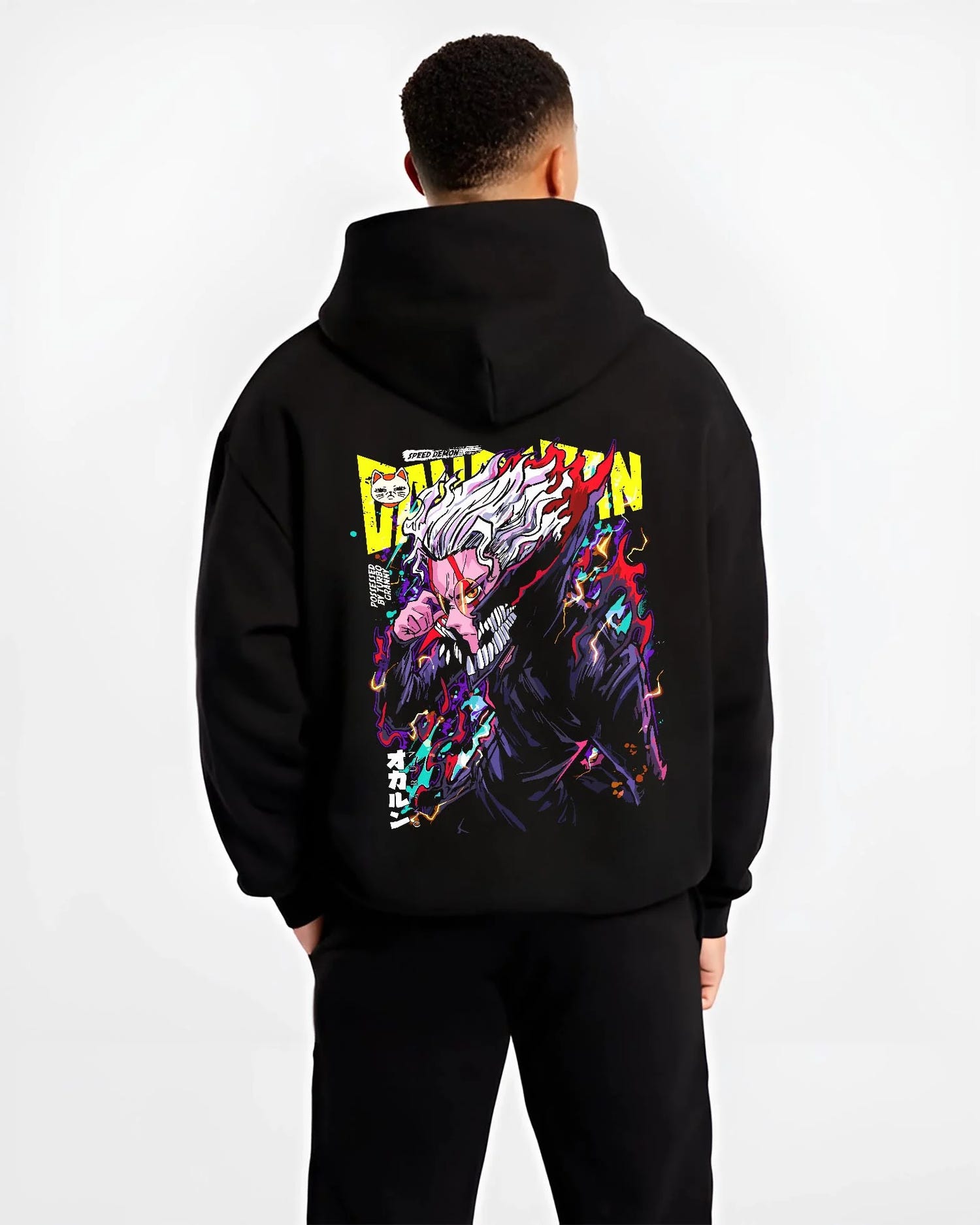 Black hoodie worn by male model, back view with Turbo Granny Hoodie Dandadan Monster Spirit Fighter graphic premium wear.