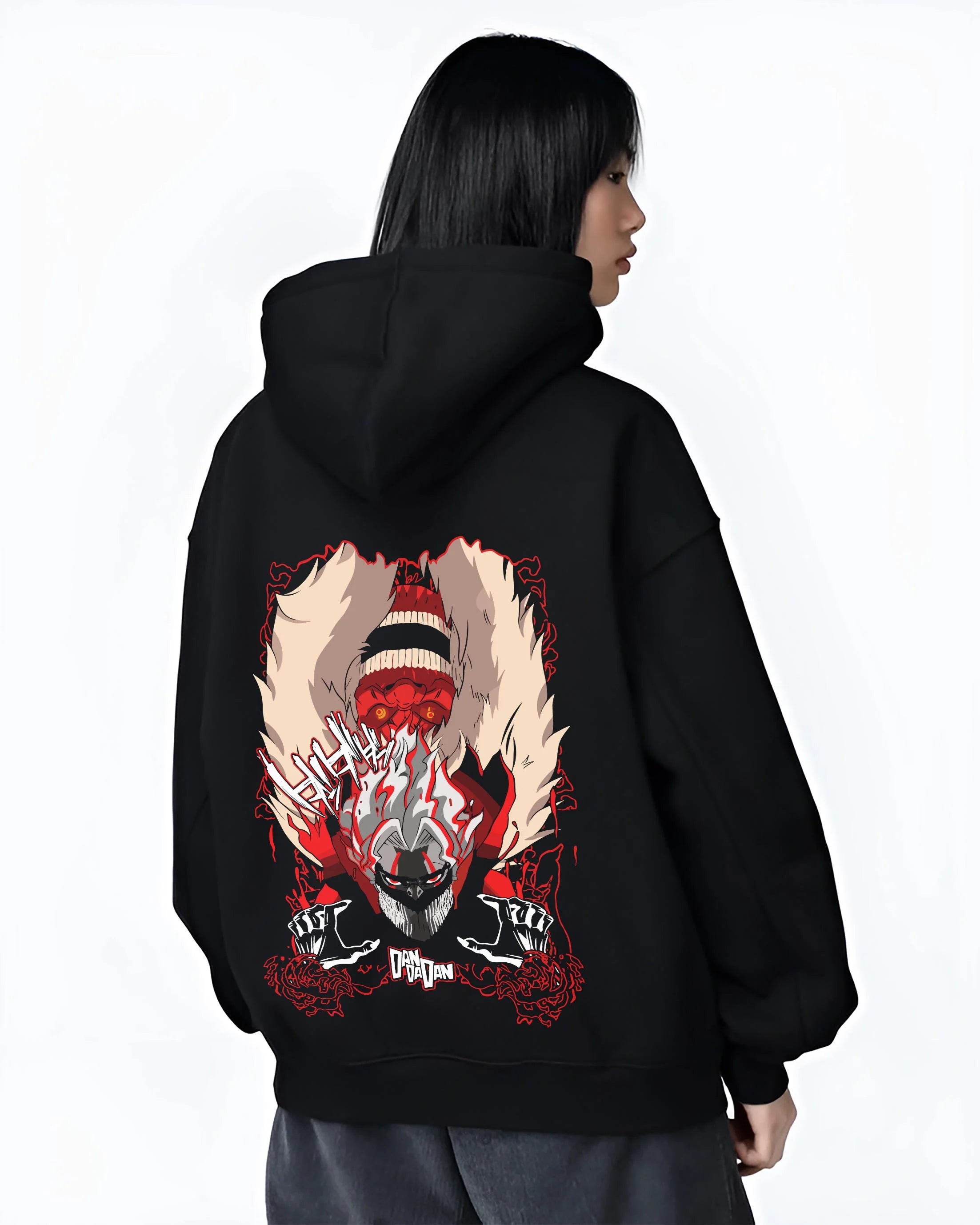 Black hoodie worn by female model, back view with Turbo Granny Dandadan Hoodie Retro Yokai Anime Horror graphic streetwear graphic.