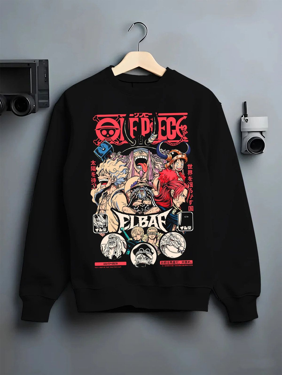 Black crewneck sweatshirt on hanger showing One Piece pirate ensemble: multiple characters