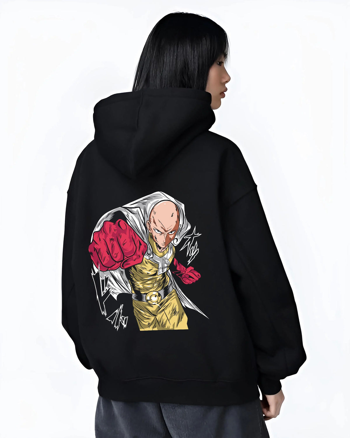 Black hoodie worn by female model from the back featuring Saitama serious hero One Punch Man artwork.