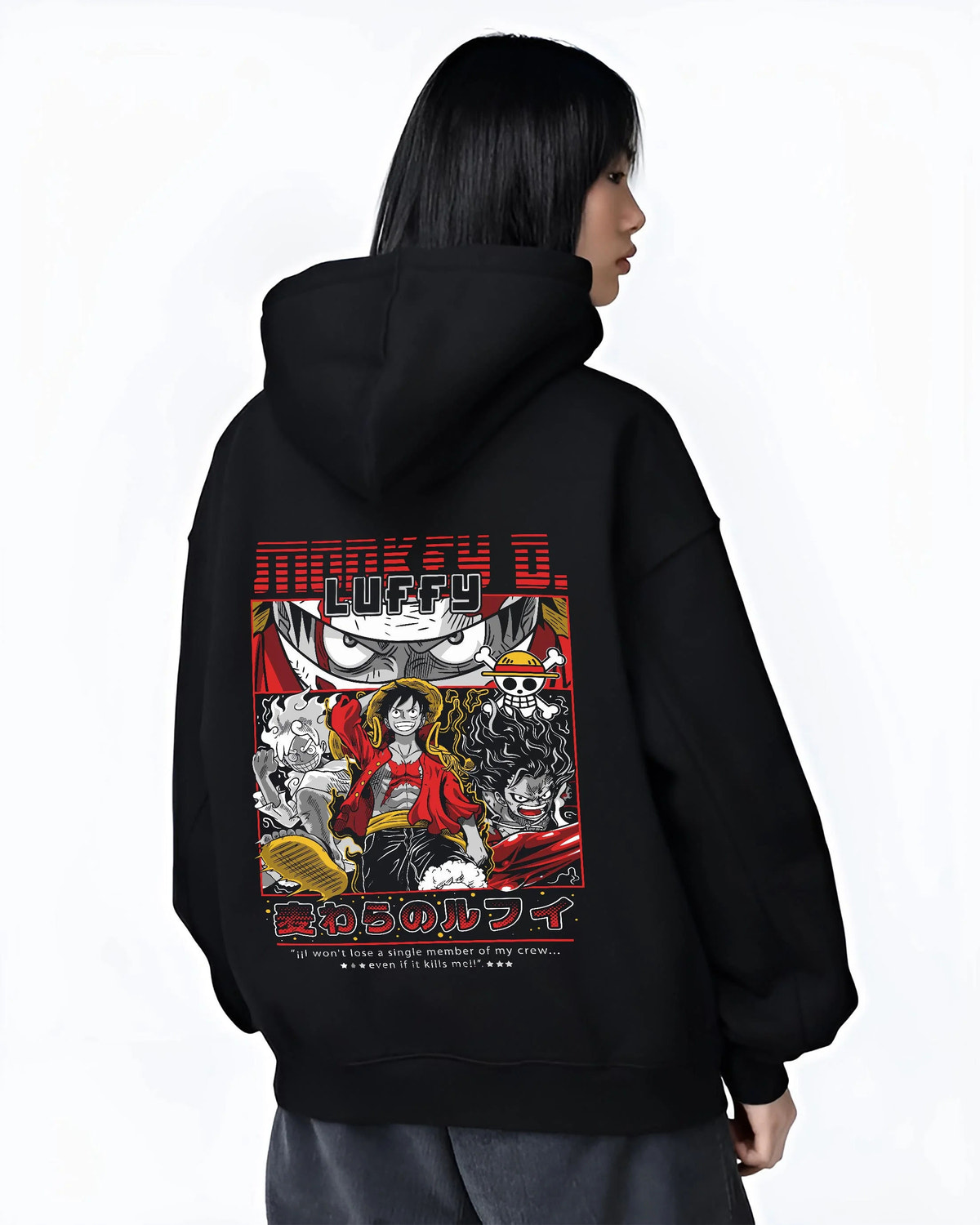 Black hoodie worn by female model from the back featuring Luffy Gear forms One Piece artwork.