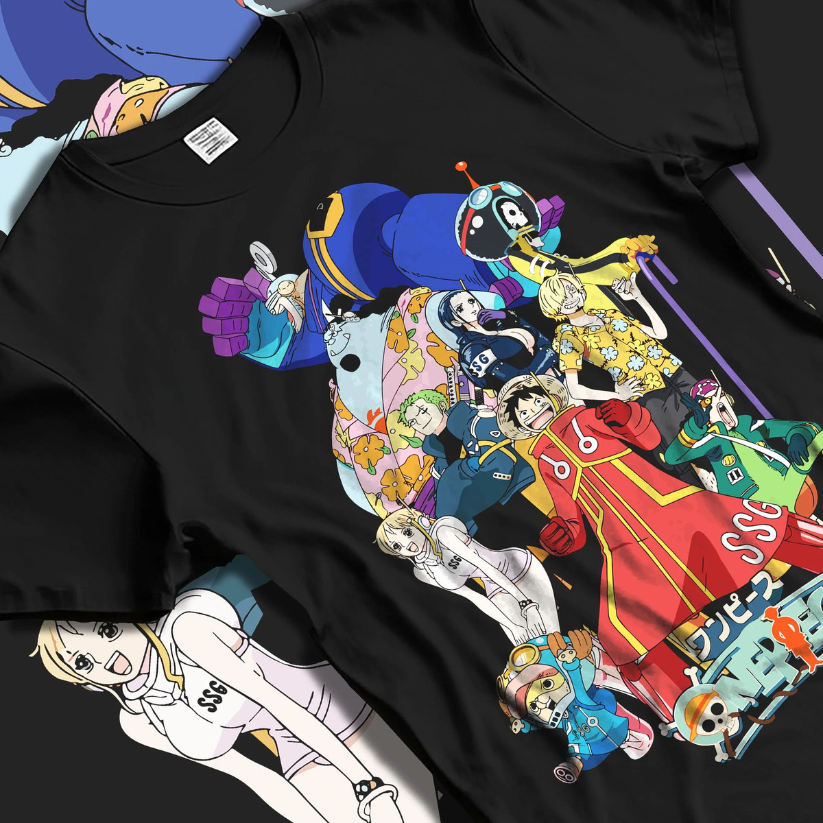 Black T-shirt laid flat with natural folds featuring Straw Hat Crew Egghead Island One Piece artwork.