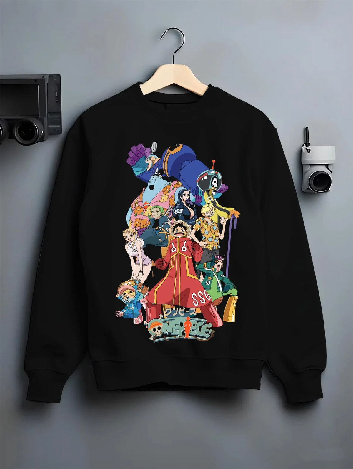 Black crewneck sweatshirt on hanger featuring Straw Hat Crew Egghead Island One Piece artwork.