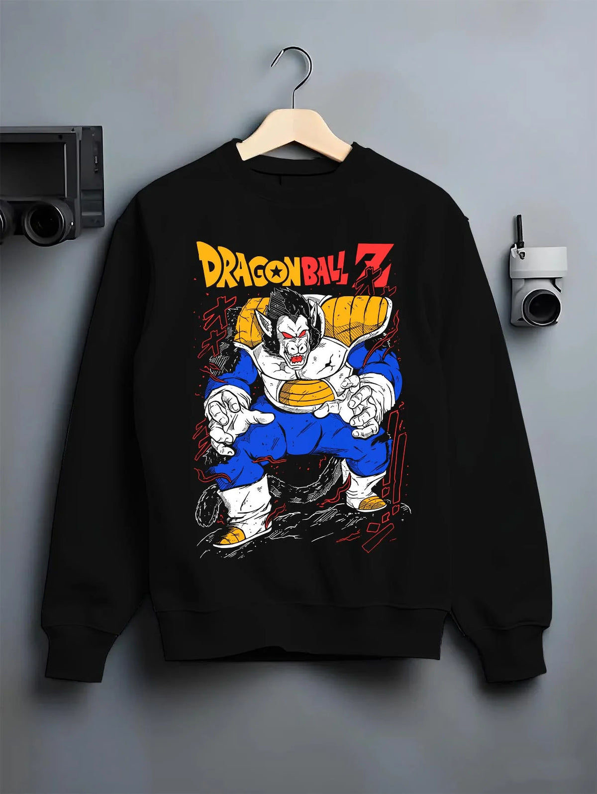 Black crewneck sweatshirt on hanger featuring Vegeta Great Ape Oozaru form Dragon Ball Z artwork.