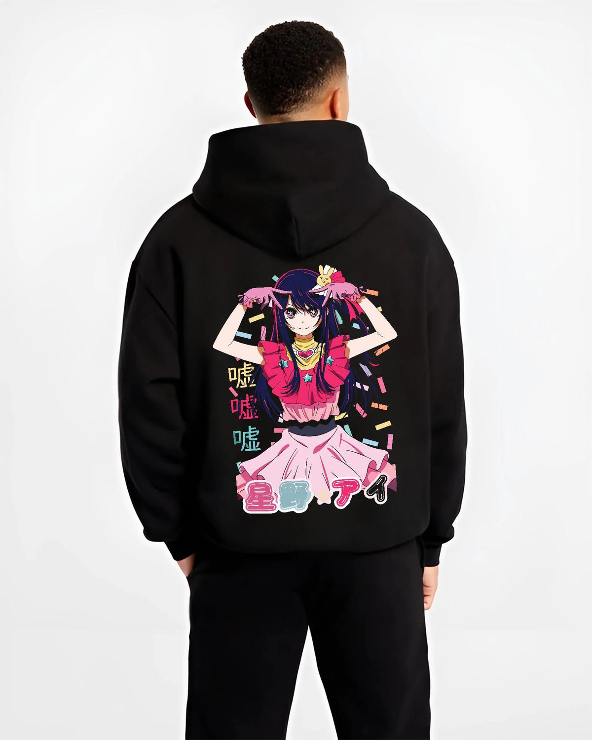 Black hoodie worn by male model from the back featuring Ai Hoshino idol star portrait Oshi no Ko artwork.