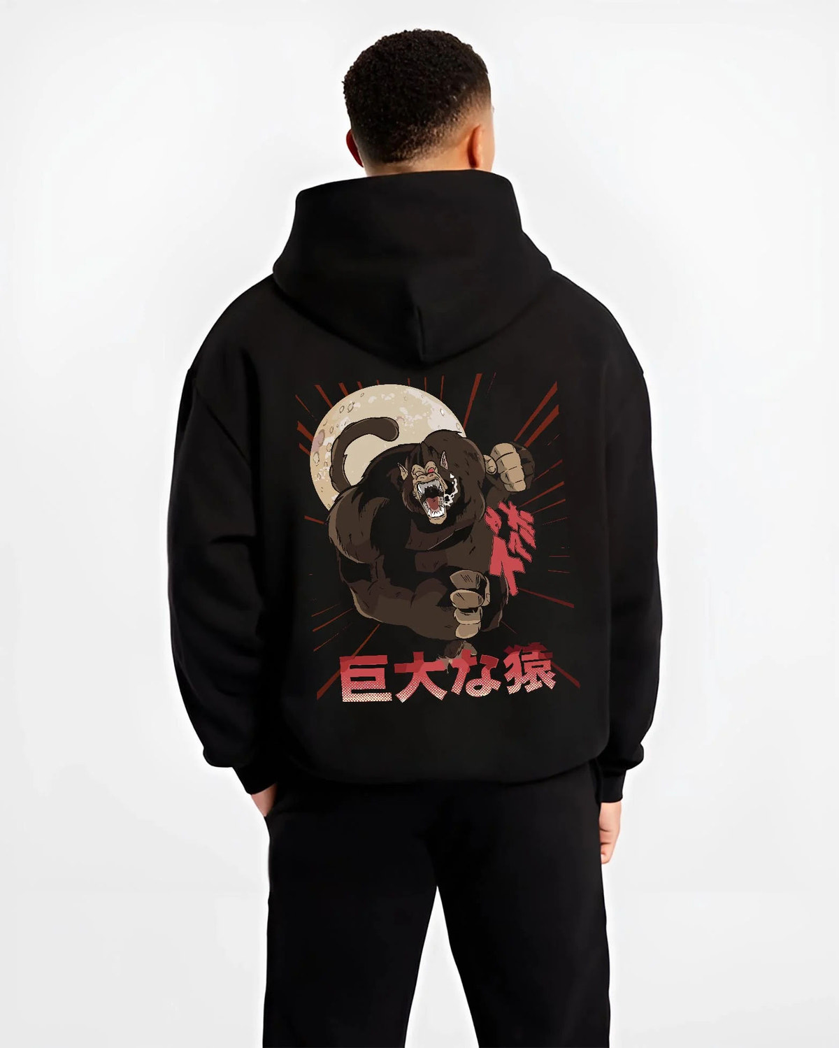 Black hoodie worn by male model from the back featuring Great Ape Oozaru Saiyan Dragon Ball artwork.