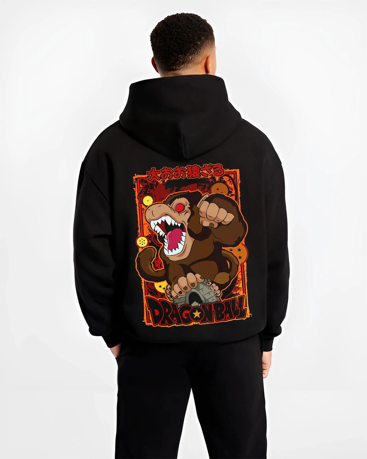 Black hoodie worn by male model from the back featuring Kid Goku Great Ape transformation Dragon Ball artwork.