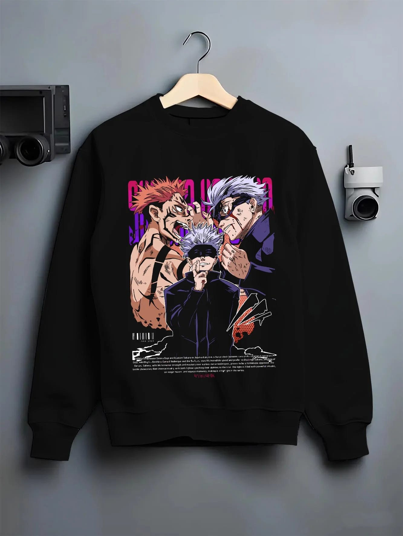 Black crewneck sweatshirt on hanger with Yuji Gojo Hoodie Jujutsu Kaisen Battle Clash graphic streetwear graphic.