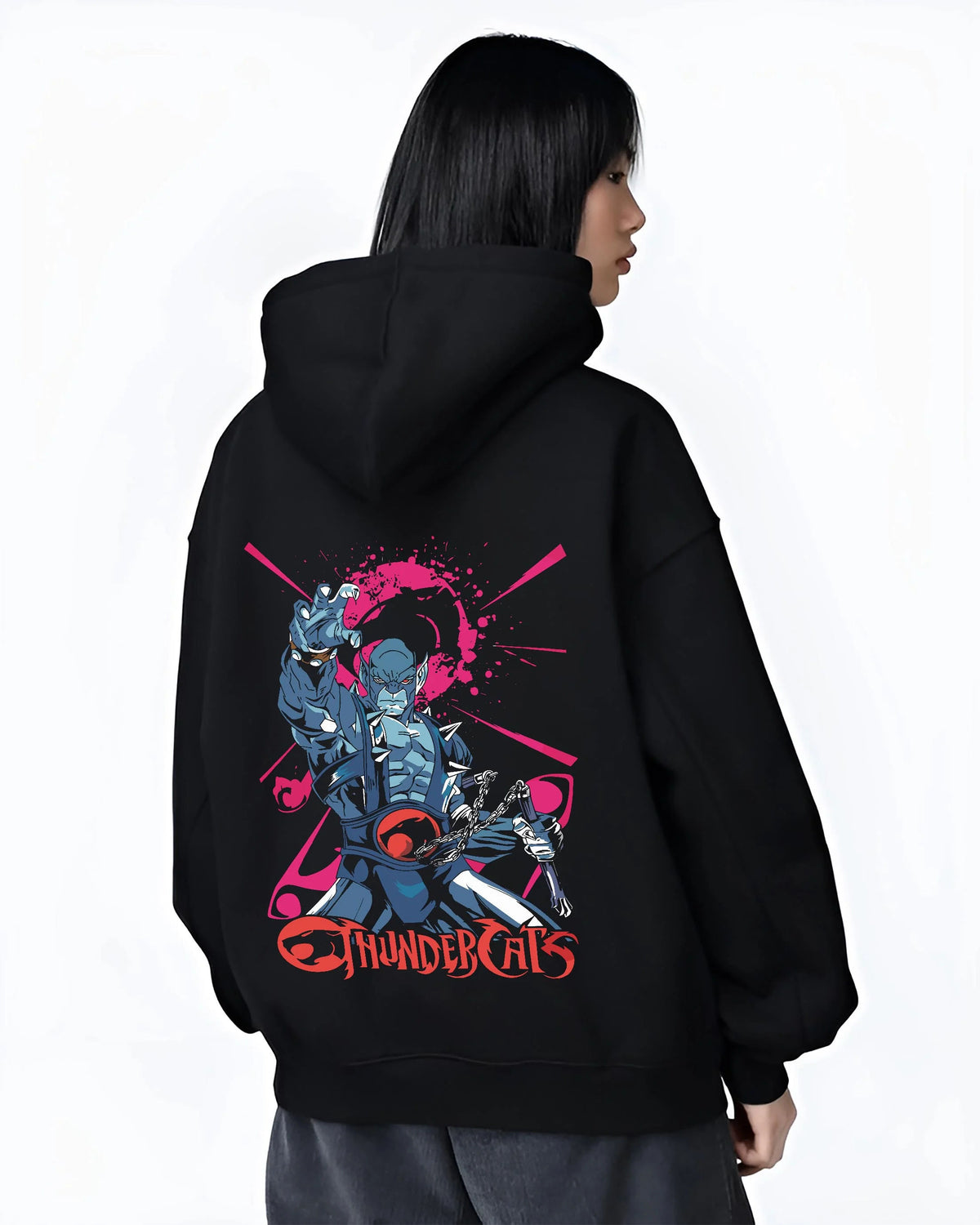Black hoodie worn by female model from the back featuring Panthro nunchaku warrior ThunderCats artwork.