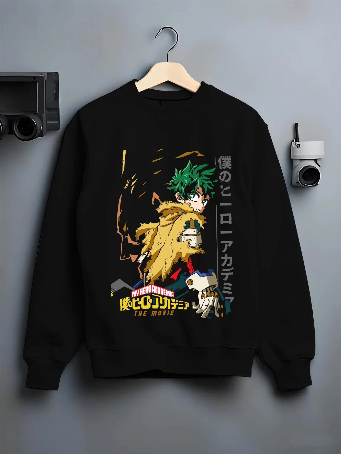 Black crewneck sweatshirt on hanger with Izuku Midoriya Hoodie My Hero Academia Hero graphic bold anime graphic.