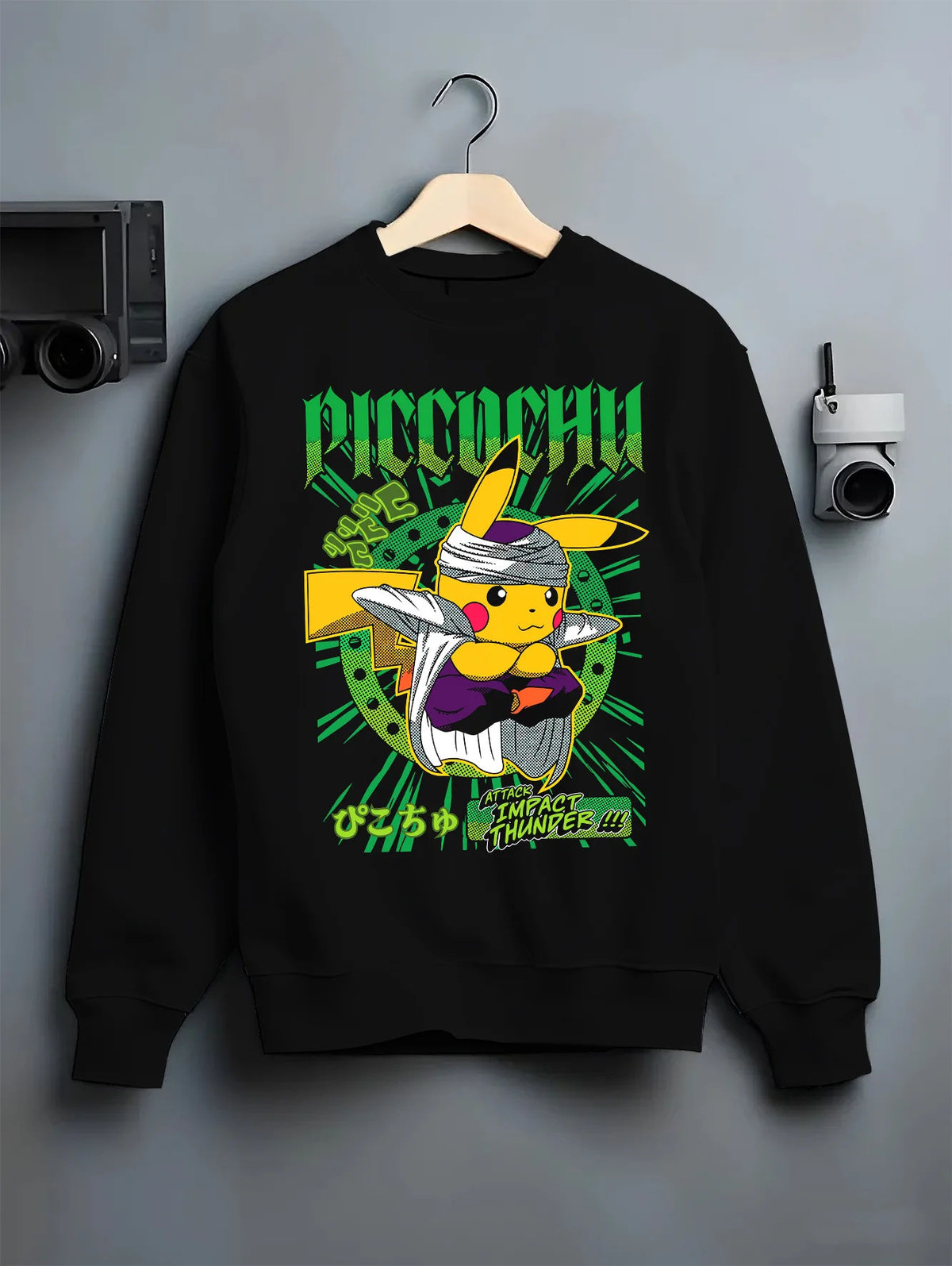 Black crewneck sweatshirt on hanger showing Pikachu wearing trainer cap from Pokémon: ramen parody