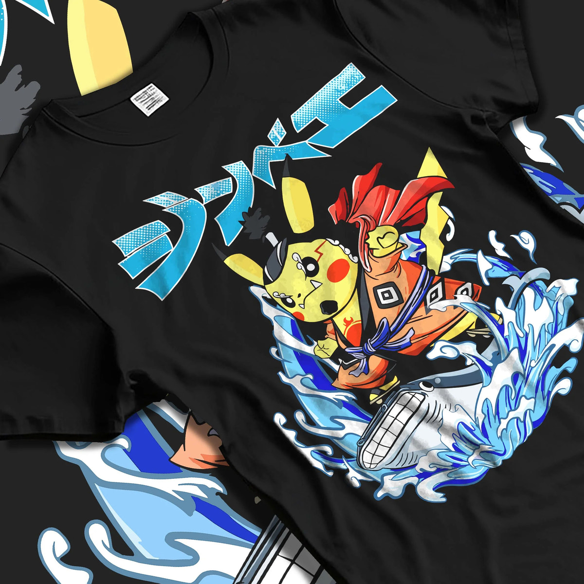 Black T-shirt laid flat with natural folds featuring Pikachu martial arts crossover Pokemon artwork.