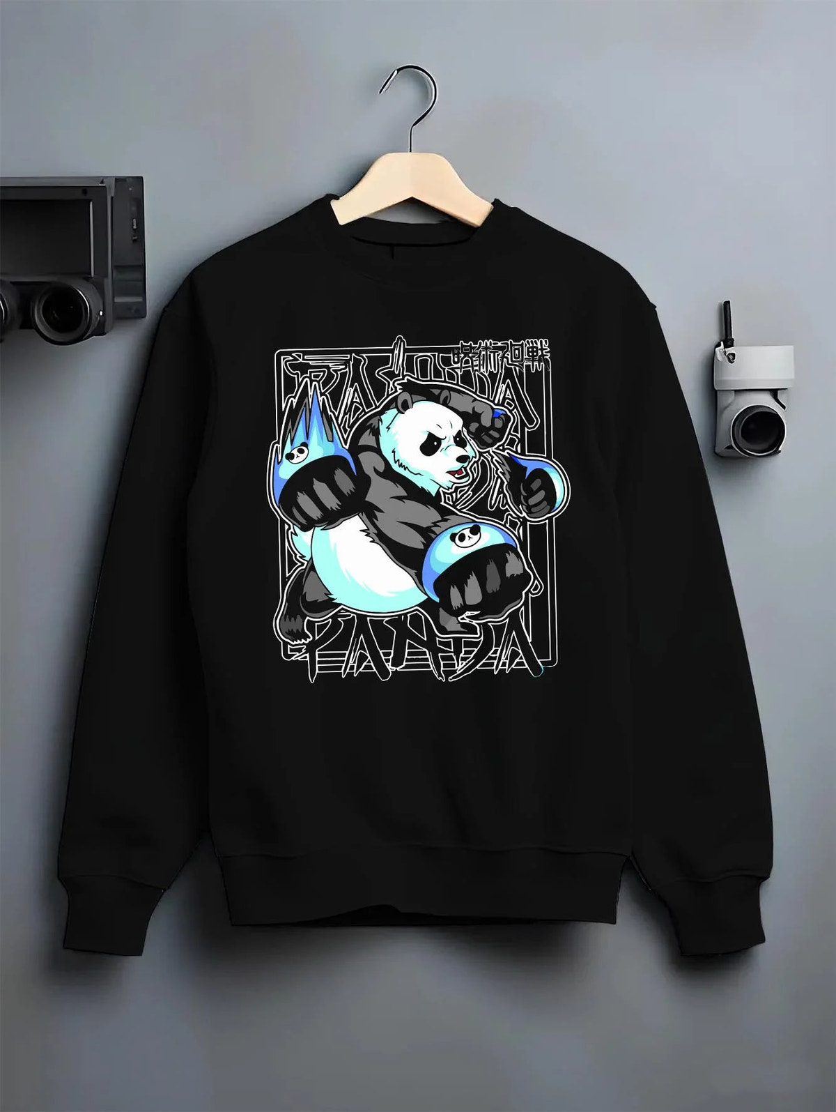 Black crewneck sweatshirt on hanger featuring Panda battle form cursed corpse Jujutsu Kaisen artwork.