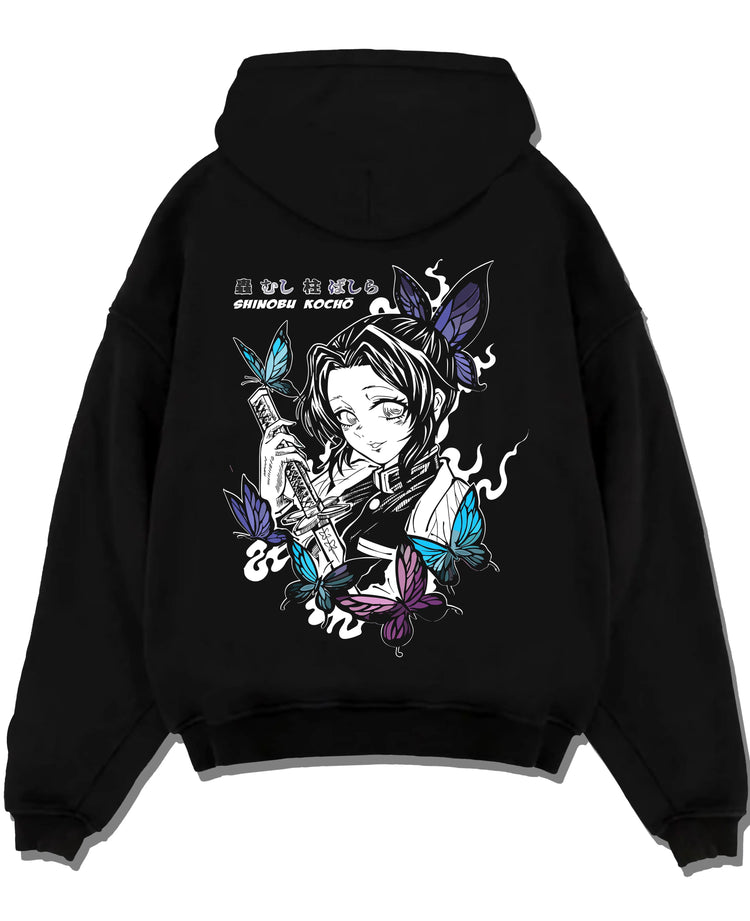 Black hoodie laid flat featuring Shinobu Kocho poison butterfly Demon Slayer artwork.