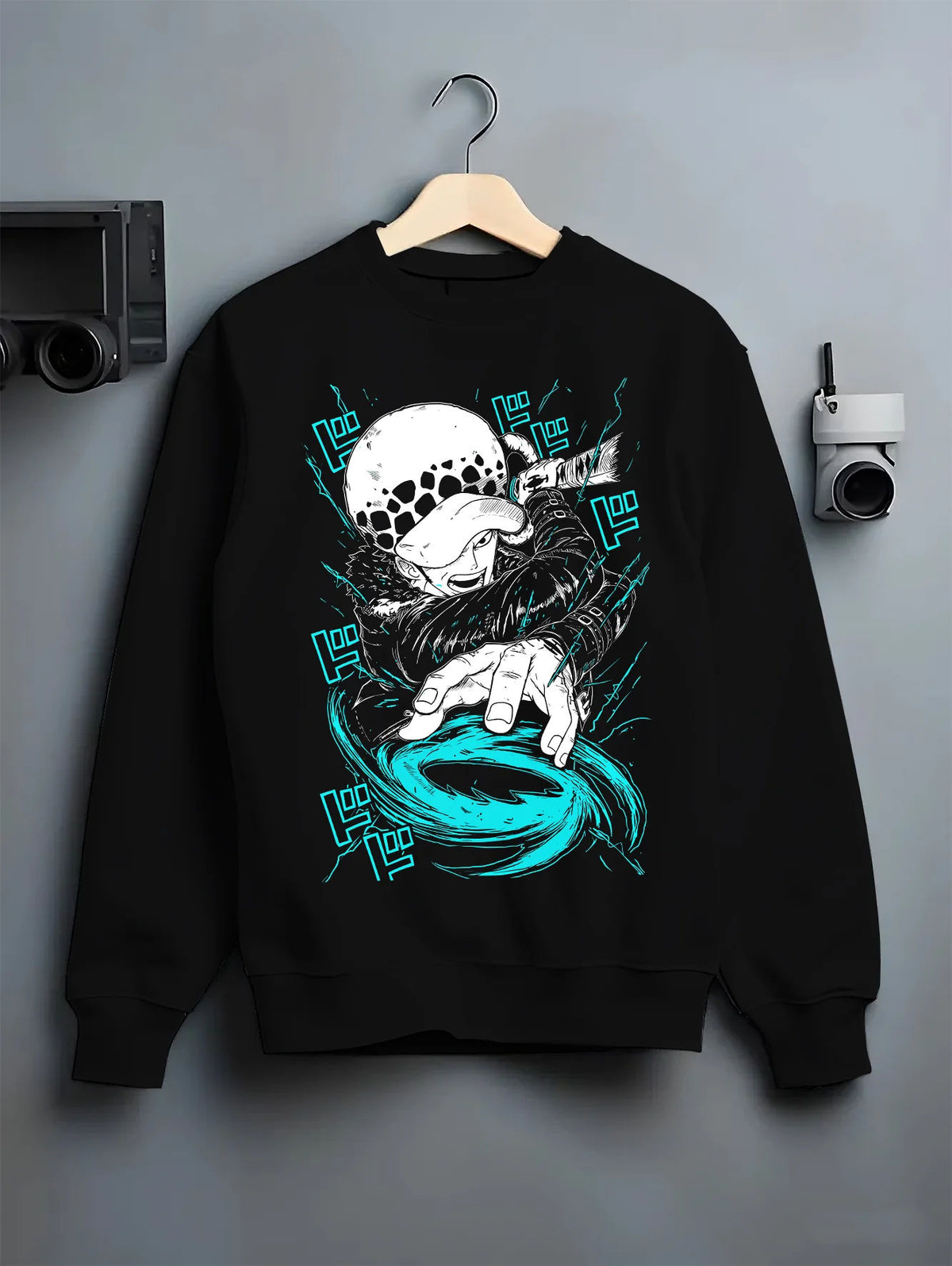 Black crewneck sweatshirt on hanger showing Trafalgar D. Water Law from One Piece: Room power