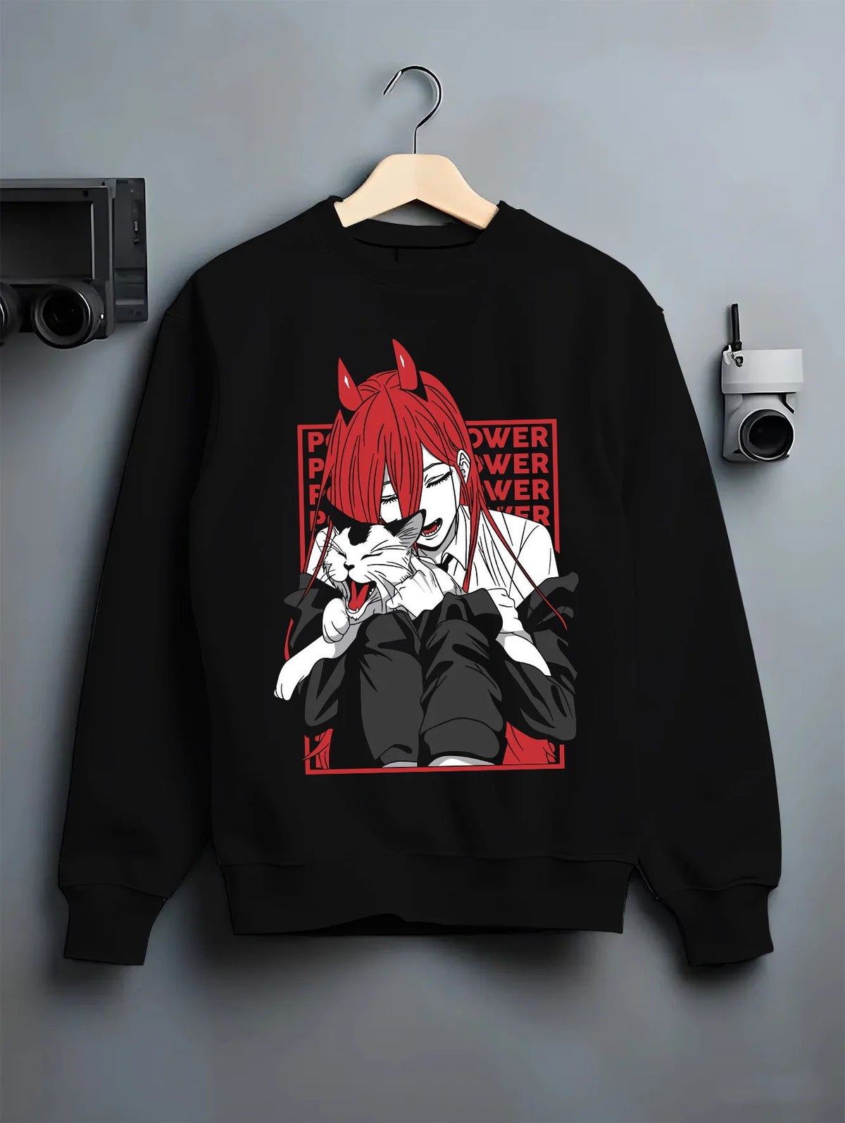 Black crewneck sweatshirt on hanger showing Power from Chainsaw Man: red-haired fiend with horns