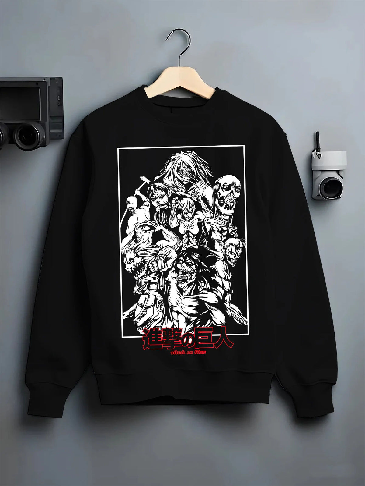 Black crewneck sweatshirt on hanger showing Attack on Titan: Eren and titans montage