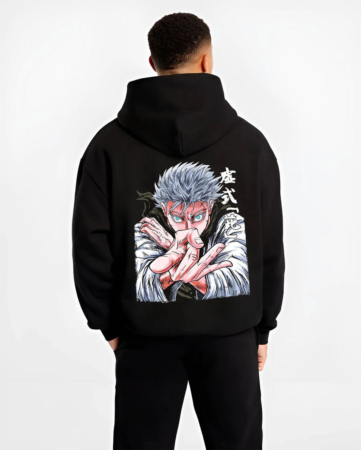 Black hoodie model back view with Satoru Gojo in fighting pose from Jujutsu Kaisen illustrated back graphic