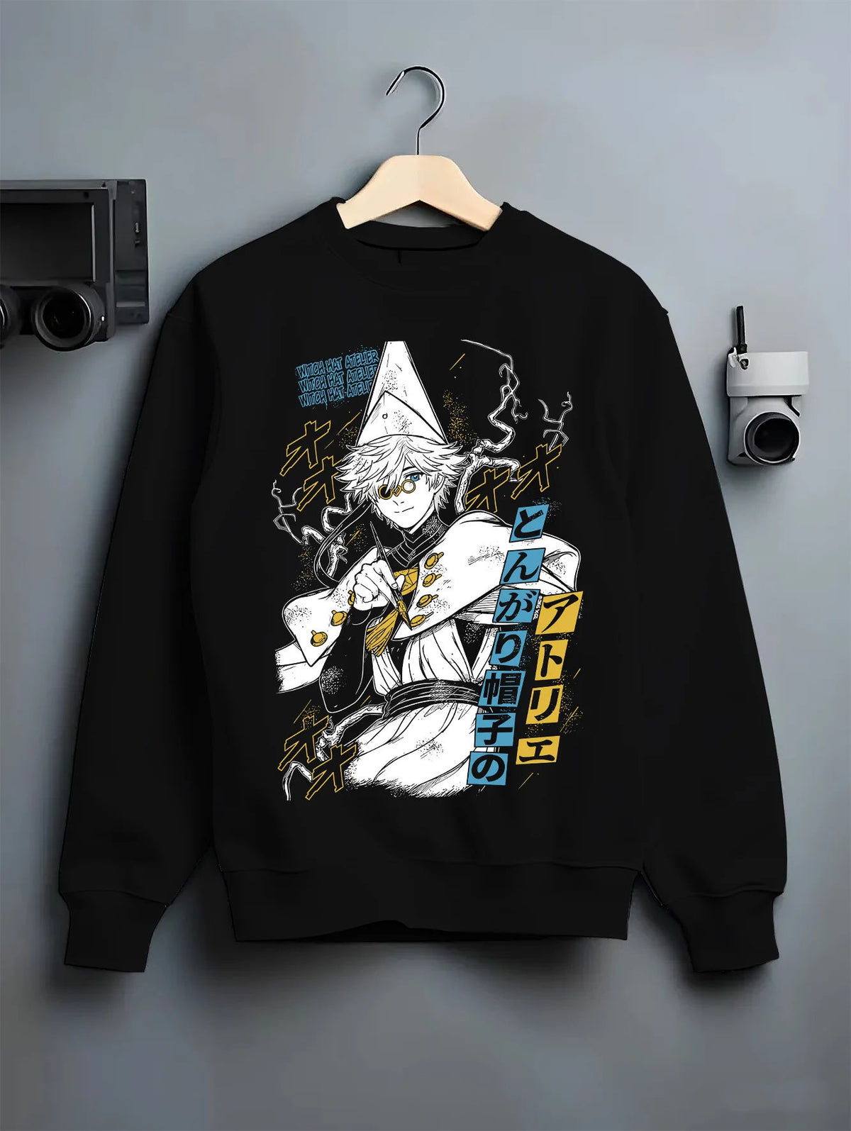 Black crewneck sweatshirt on hanger showing Qifrey from Witch Hat Atelier: Witch Hat Atelier