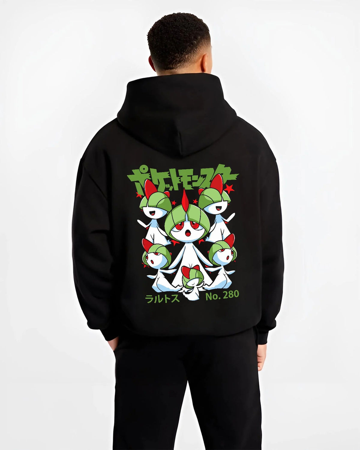Black hoodie worn by male model from the back featuring Ralts psychic fairy evolution family Pokemon artwork.