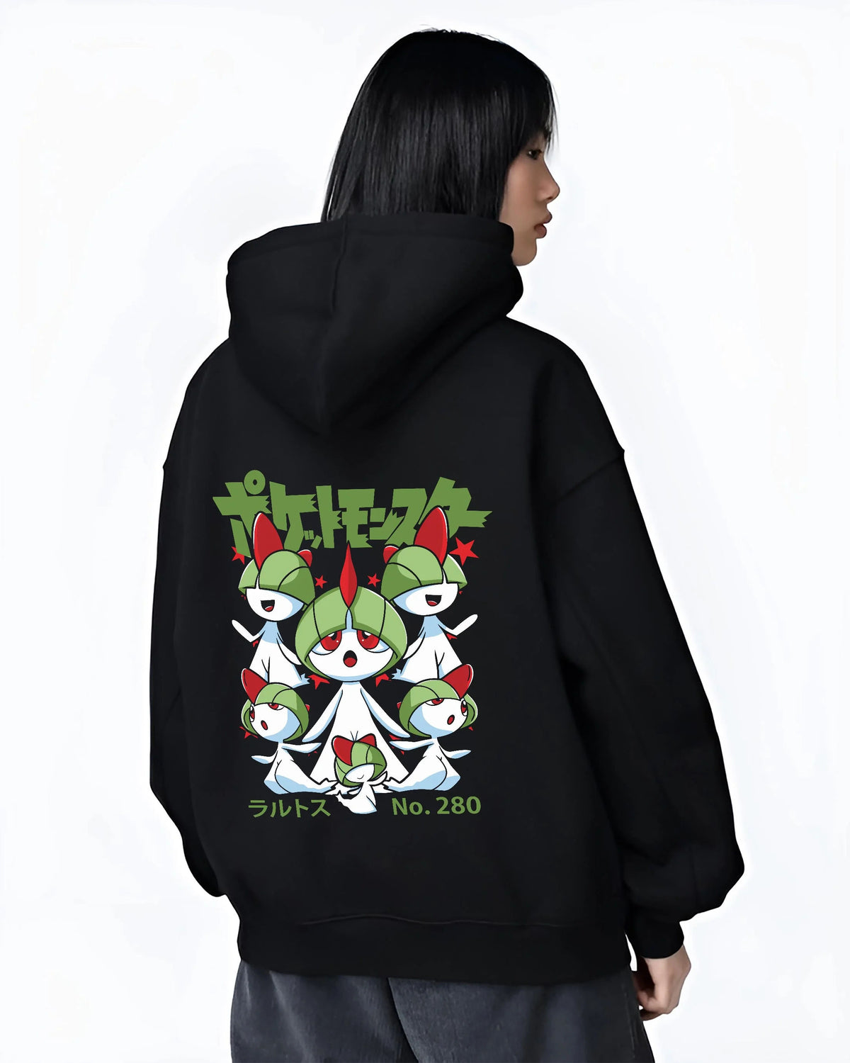 Black hoodie worn by female model from the back featuring Ralts psychic fairy evolution family Pokemon artwork.