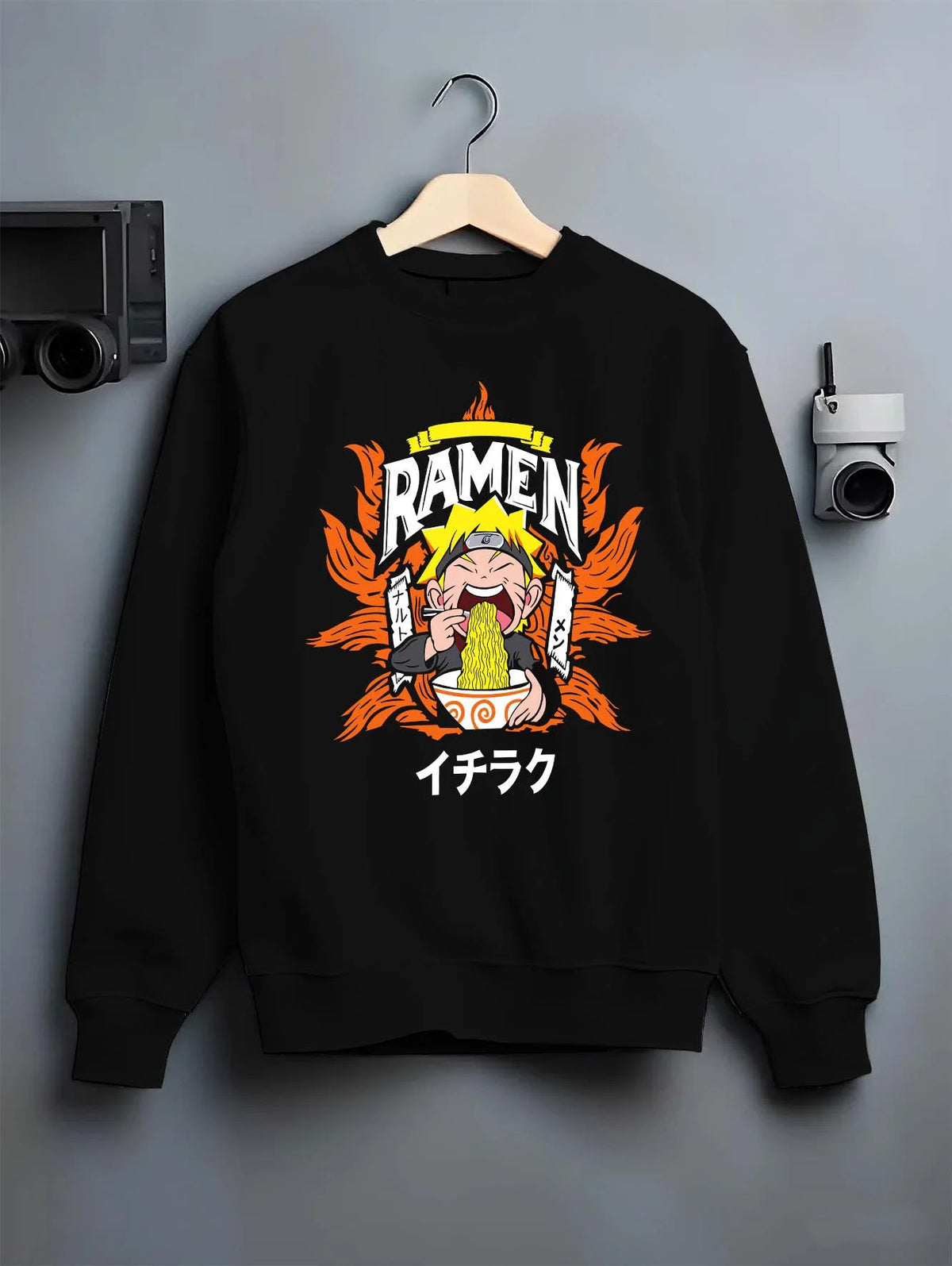 Black crewneck sweatshirt on hanger featuring Naruto Ichiraku ramen artwork.