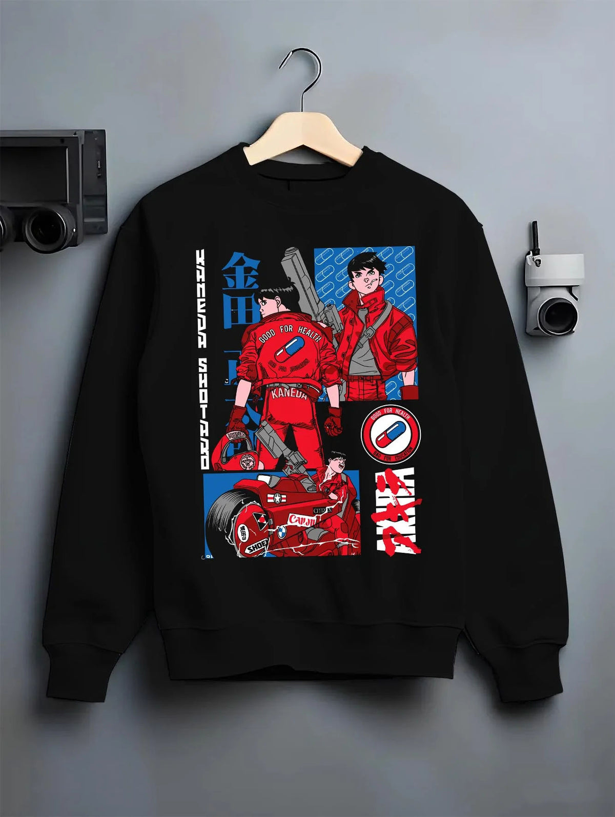 Black crewneck sweatshirt on hanger featuring Shotaro Kaneda red motorcycle Akira artwork.