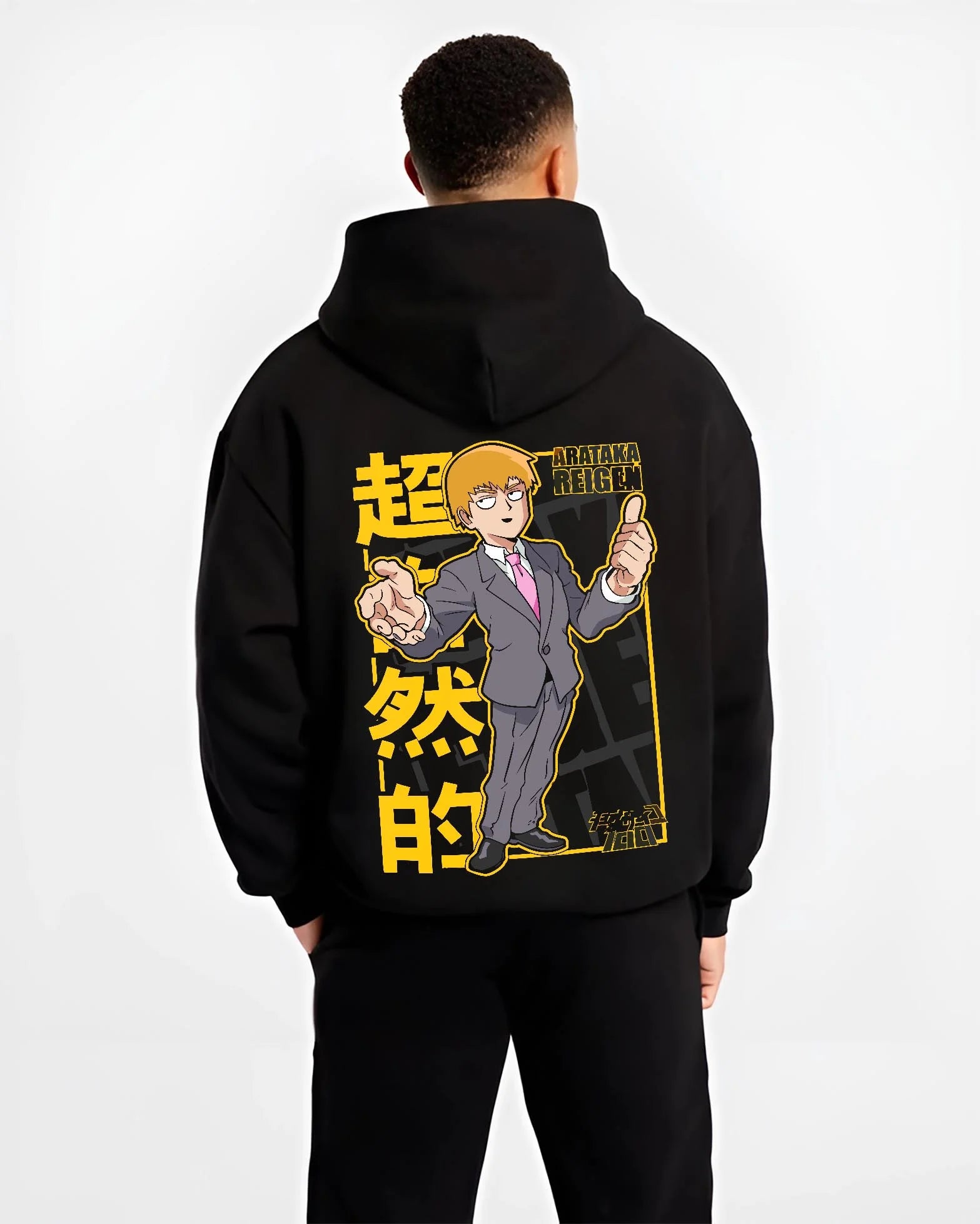 Black hoodie worn by male model, back view with Reigen Hoodie Mob Psycho 100 Master of Exorcism graphic bold anime graphic.