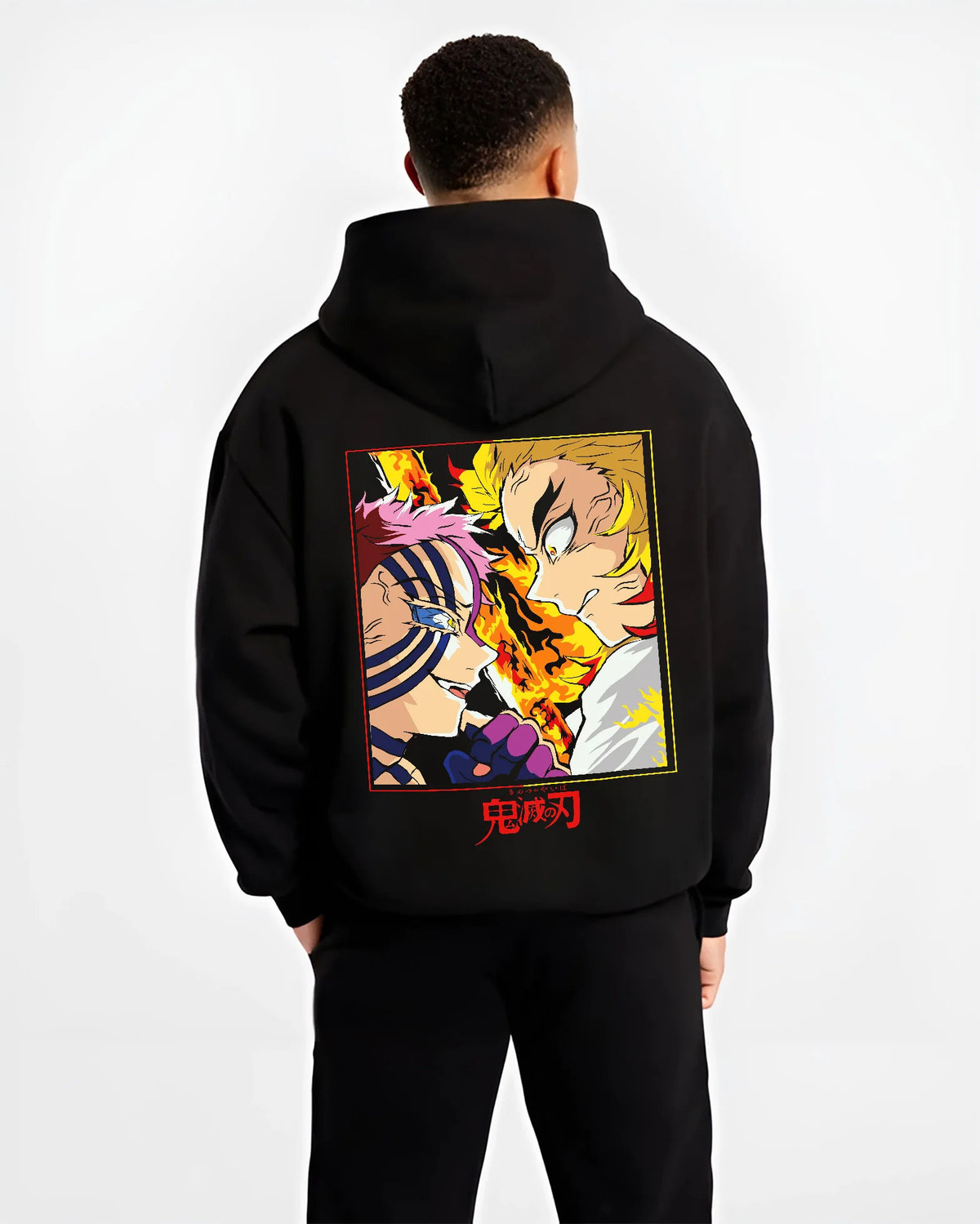 Black hoodie model back view showing Kyojuro Rengoku from Demon Slayer: flame sword and blaze