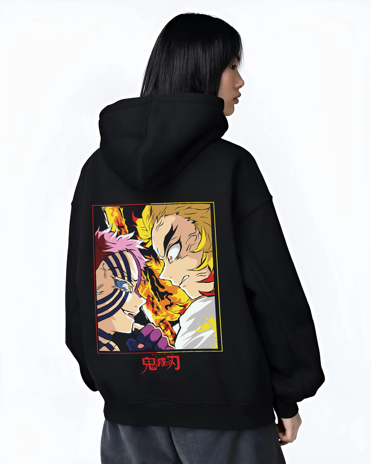 Black hoodie female model back view showing Kyojuro Rengoku from Demon Slayer: flame sword and blaze