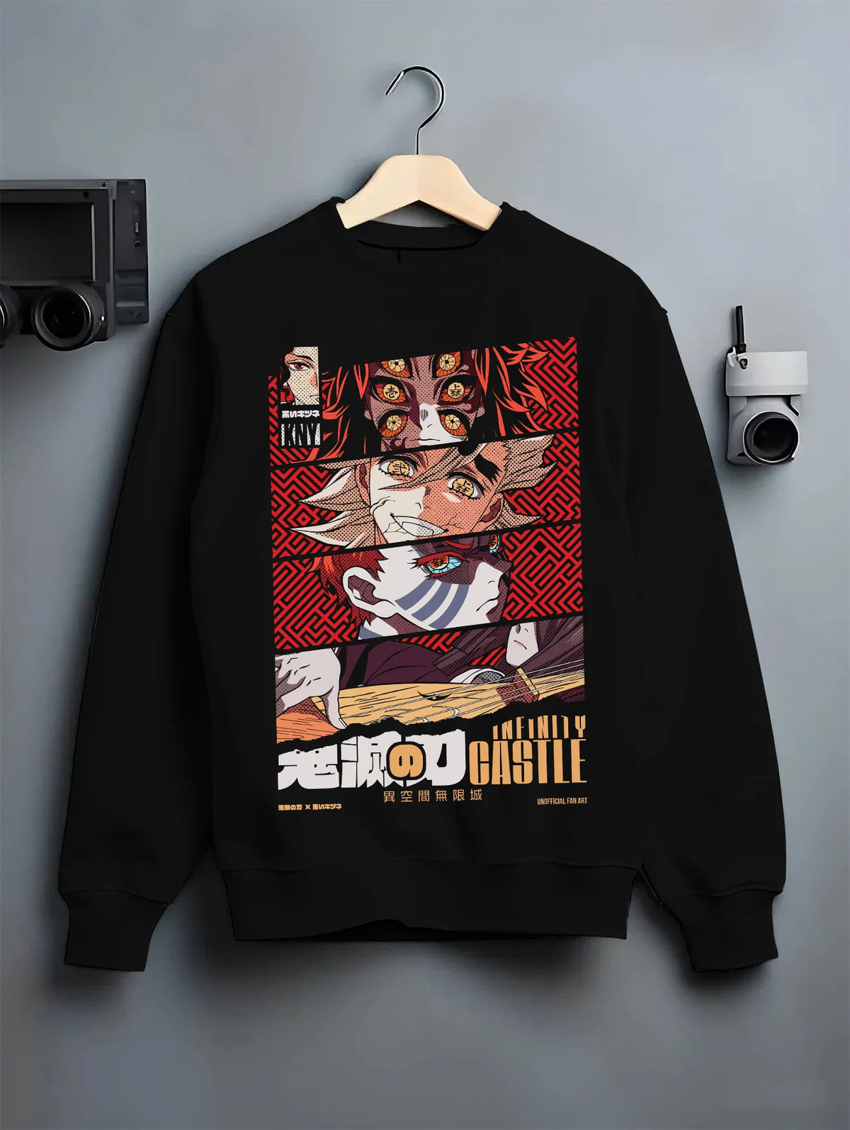 Black crewneck sweatshirt on hanger showing Kyojuro Rengoku from Demon Slayer: manga close-up