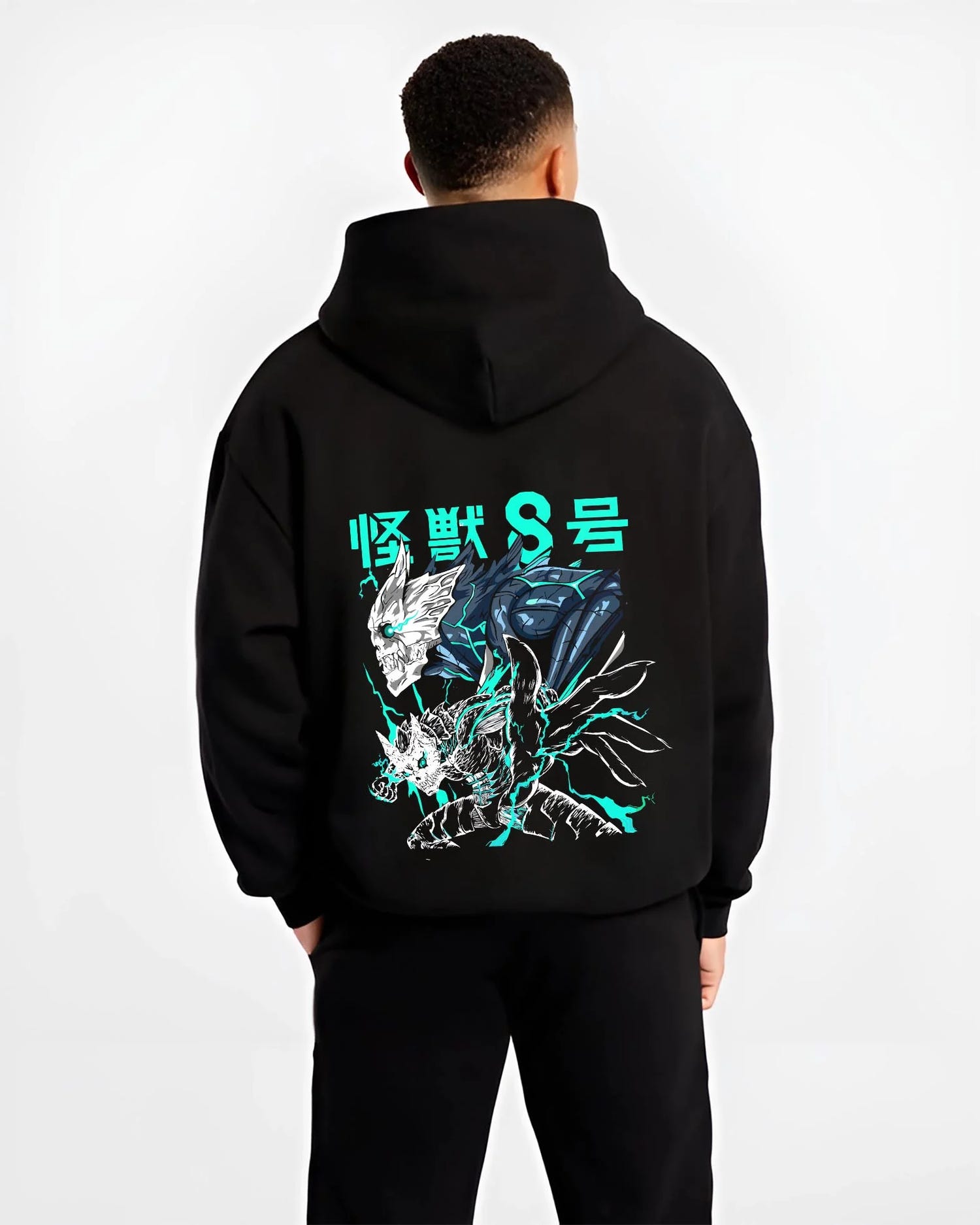 Black hoodie worn by male model, back view with Reno Ichikawa Hoodie Kaiju No. 8 Transformation graphic streetwear graphic.