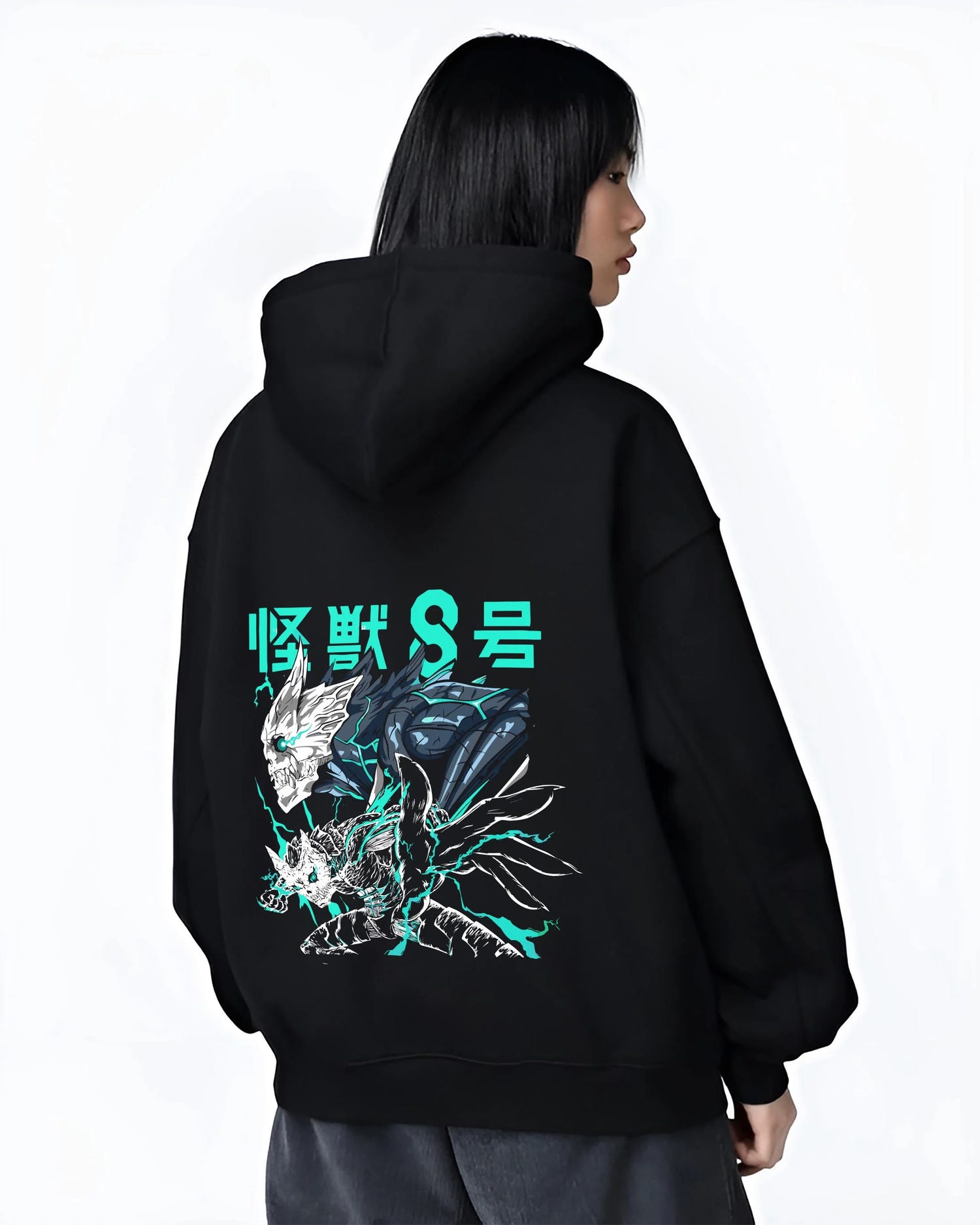 Black hoodie worn by female model, back view with Reno Ichikawa Hoodie Kaiju No. 8 Transformation graphic streetwear graphic.