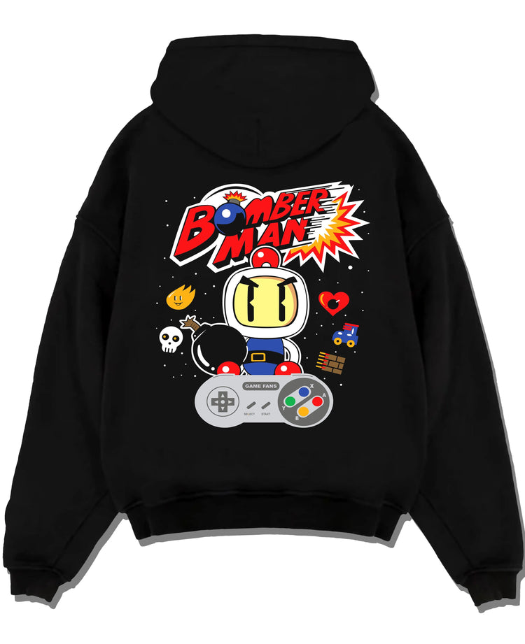 Black hoodie laid flat featuring Bomberman retro 8-bit arcade artwork.