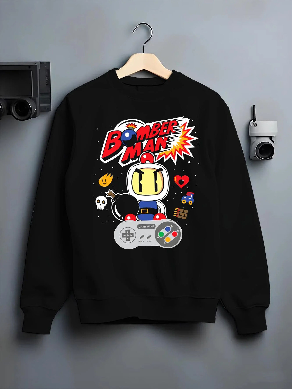 Black crewneck sweatshirt on hanger featuring Bomberman retro 8-bit arcade artwork.
