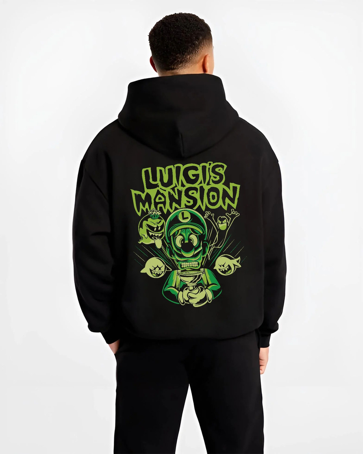 Black hoodie worn by male model from the back featuring Luigi ghost hunter Luigi's Mansion artwork.