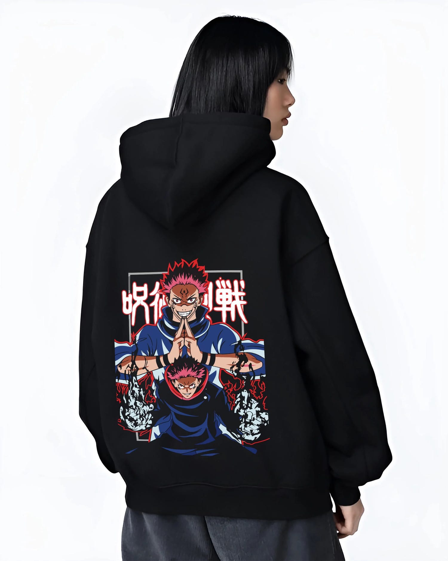 Black hoodie worn by female model, back view with Yuji Itadori Hoodie Jujutsu Kaisen Action Pose graphic streetwear graphic.