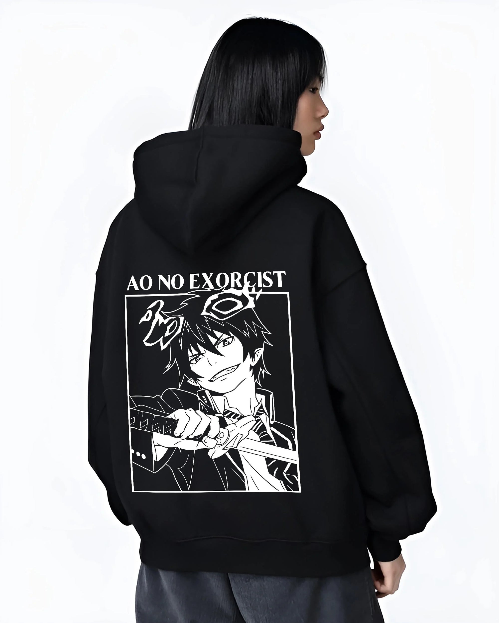 Black hoodie worn by female model, back view with Rin Okumura Hoodie Blue Exorcist Flames of Satan graphic streetwear graphic.