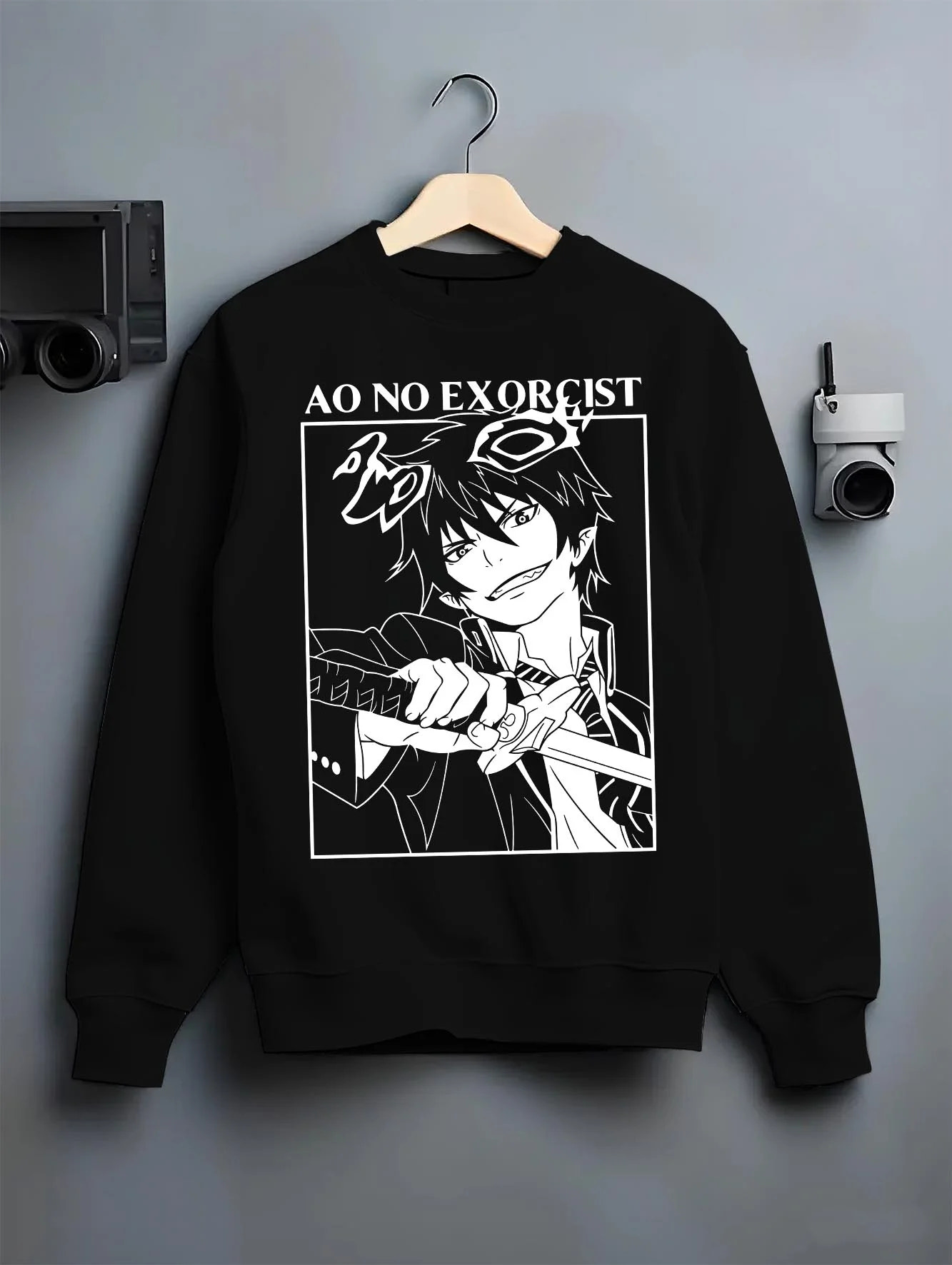 Black crewneck sweatshirt on hanger with Rin Okumura Hoodie Blue Exorcist Flames of Satan graphic bold anime graphic.
