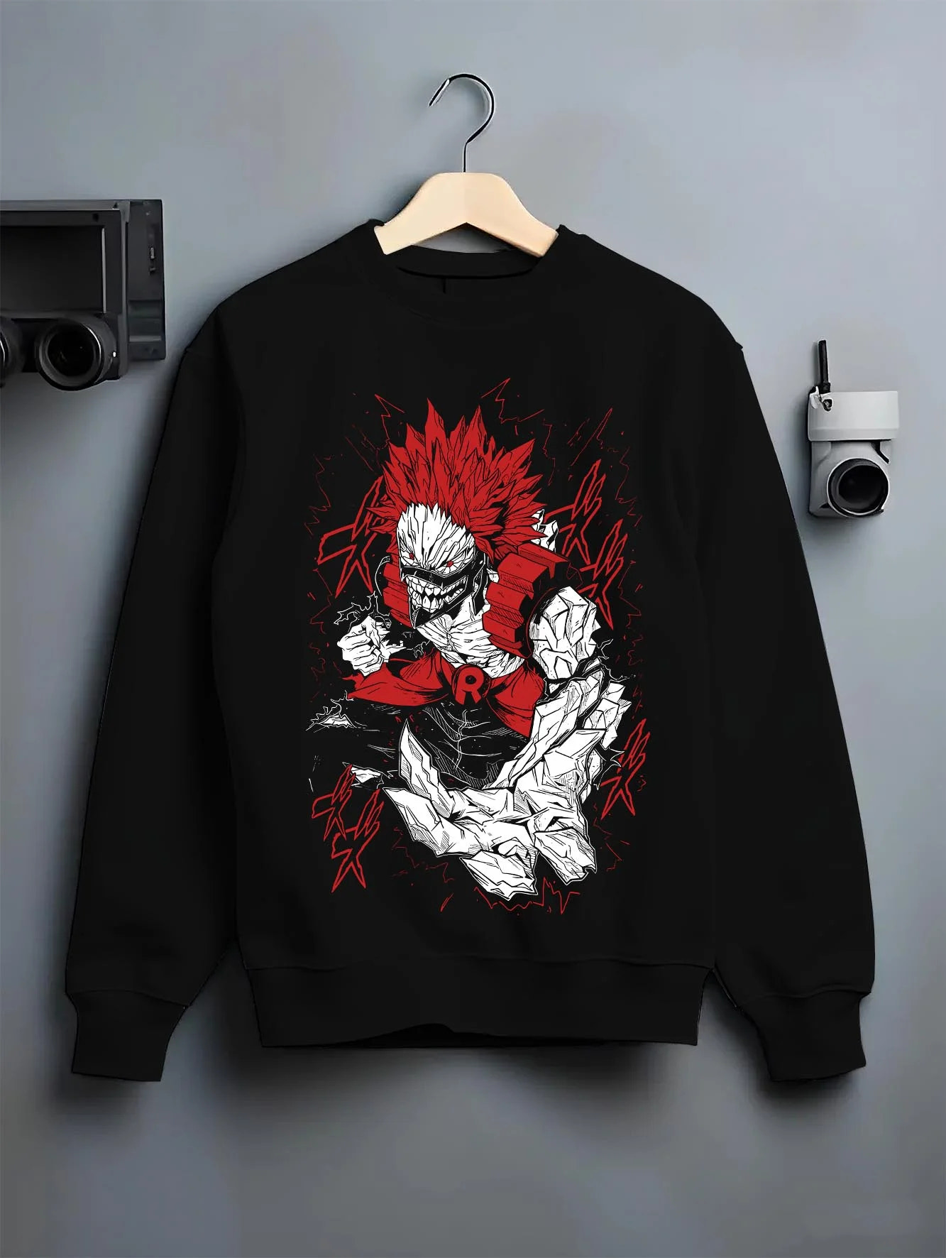 Black crewneck sweatshirt on hanger with Eijiro Kirishima Hoodie My Hero Academia Red Riot Hero graphic bold anime graphic.