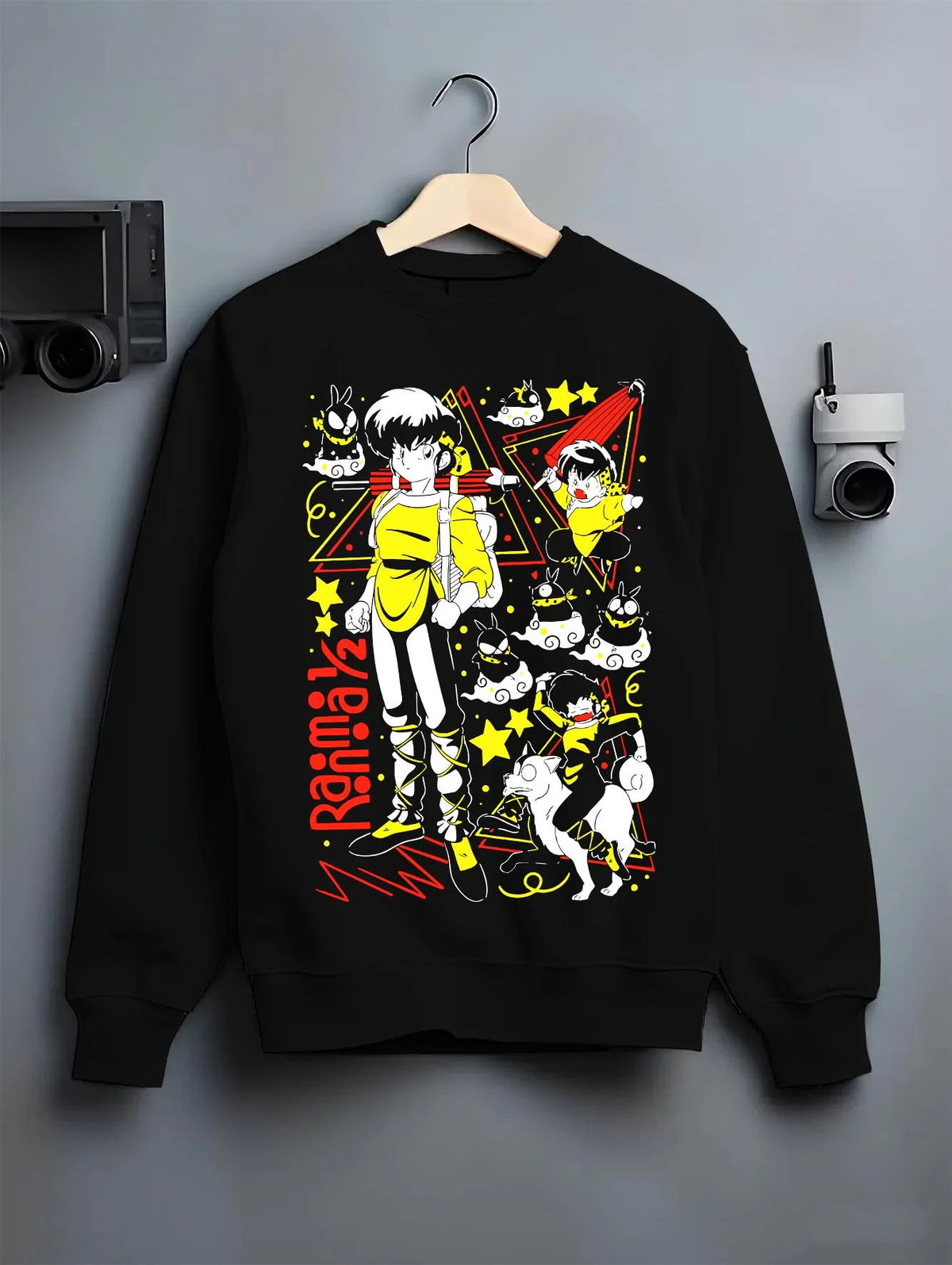 Black crewneck sweatshirt on hanger featuring Ranma 1/2 cursed spring and panda artwork.