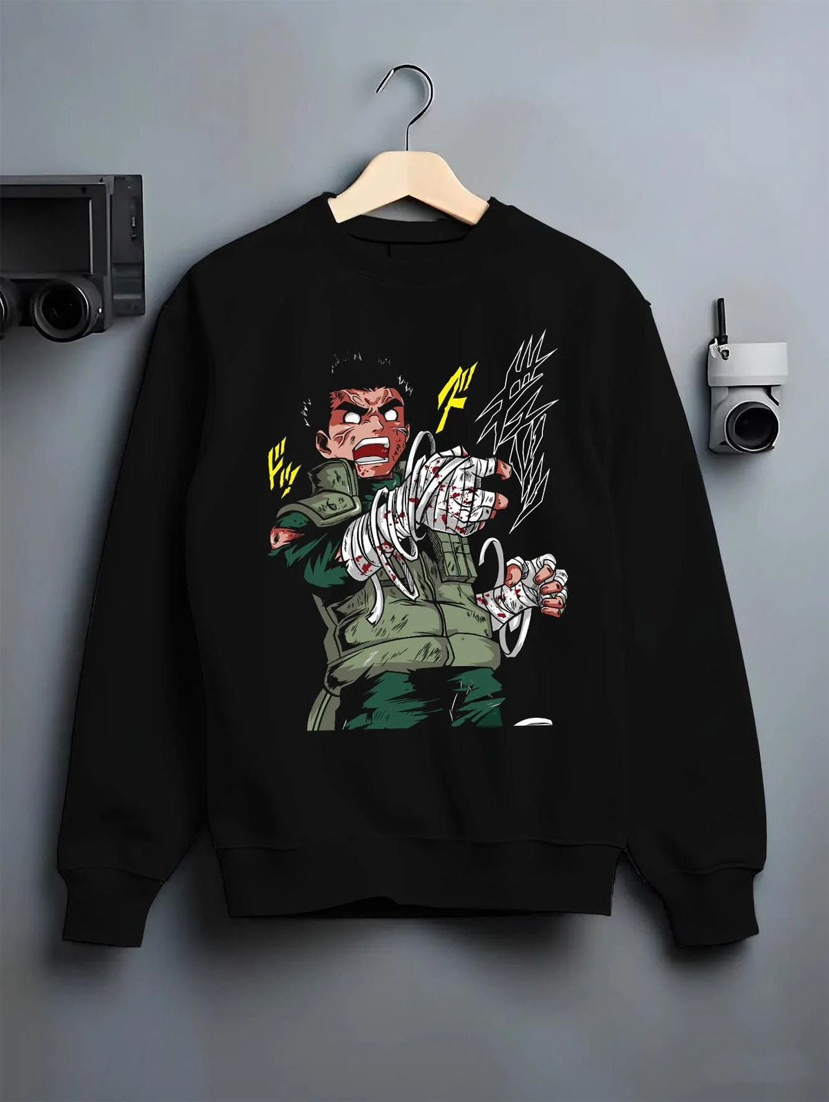 Black crewneck sweatshirt on hanger featuring Rock Lee bandaged fist taijutsu Naruto artwork.