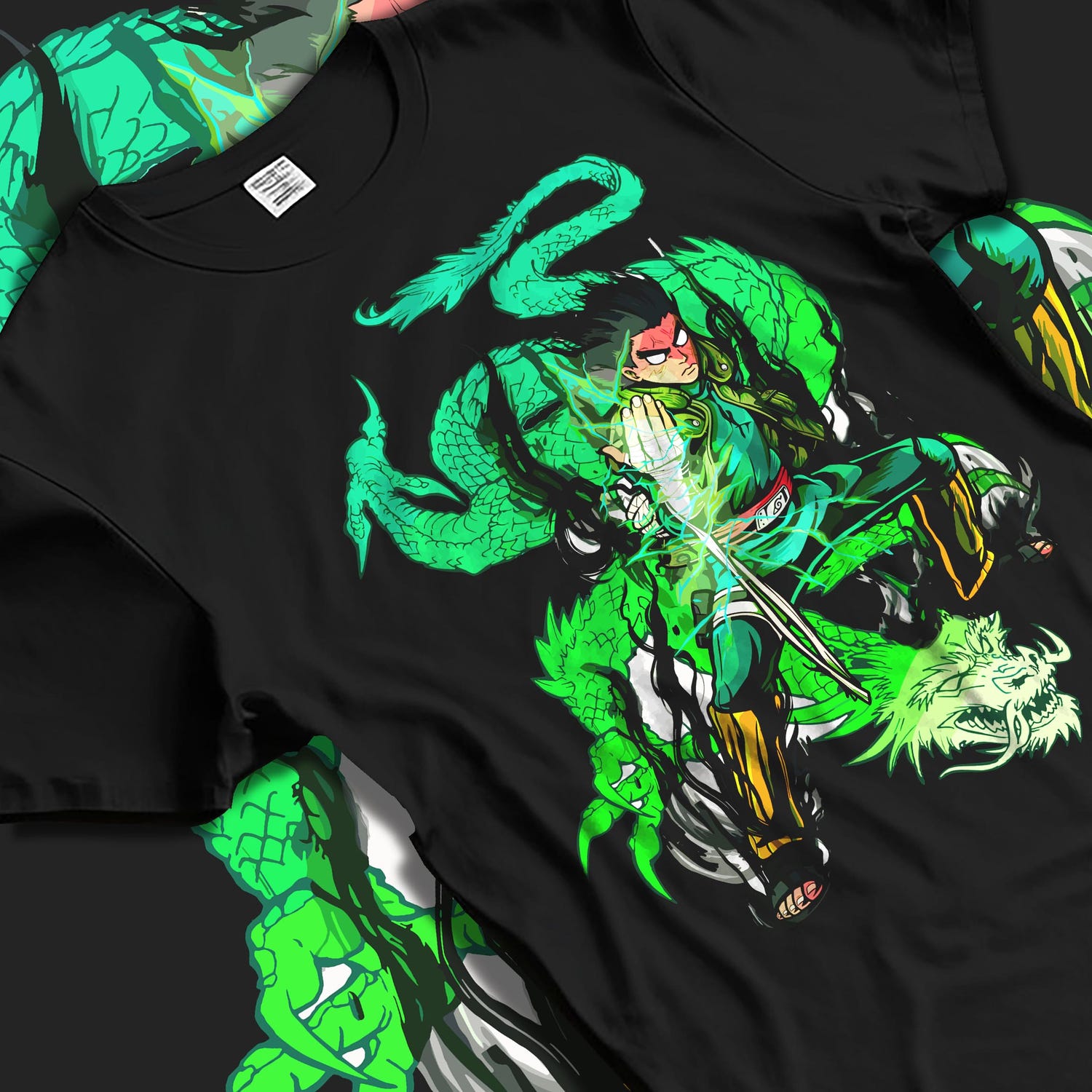 Black T-shirt laid flat with natural fabric folds, featuring Dragon Ball Gohan anime poster inspired artwork with glowing green Shenron dragon aura in retro manga graphic style.