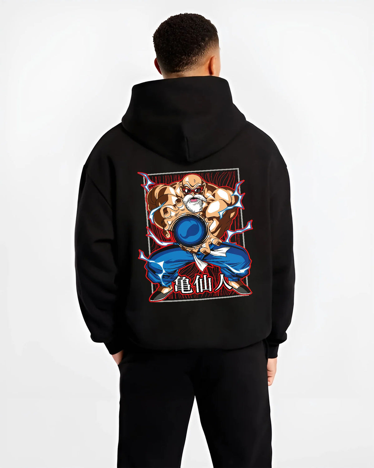 Black hoodie model back view showing Master Roshi / Kame-Sennin from Dragon Ball: Kamehameha