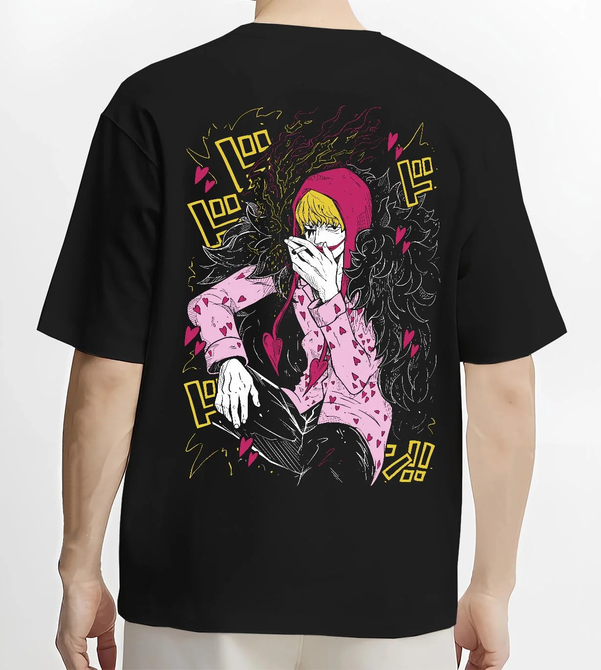 Black T-shirt worn by male model, back view, featuring Japanese animation streetwear graphic of Corazon from One Piece.